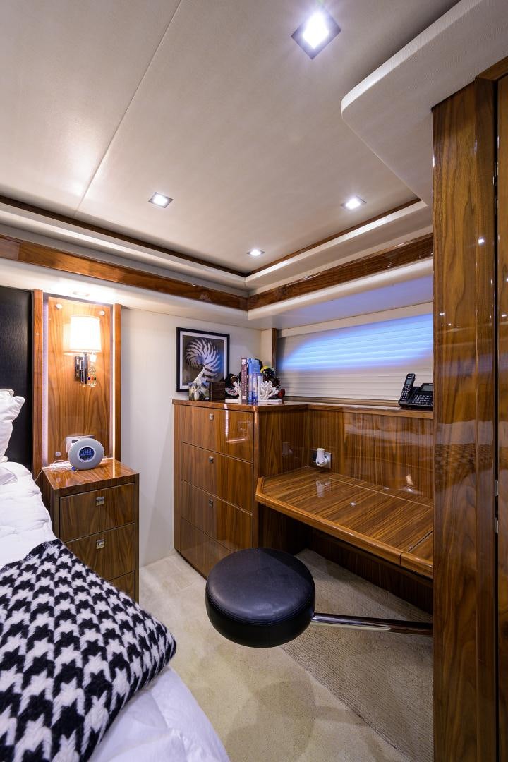 a bedroom with a large mirror aboard SET IN MY WAVES Yacht for Sale