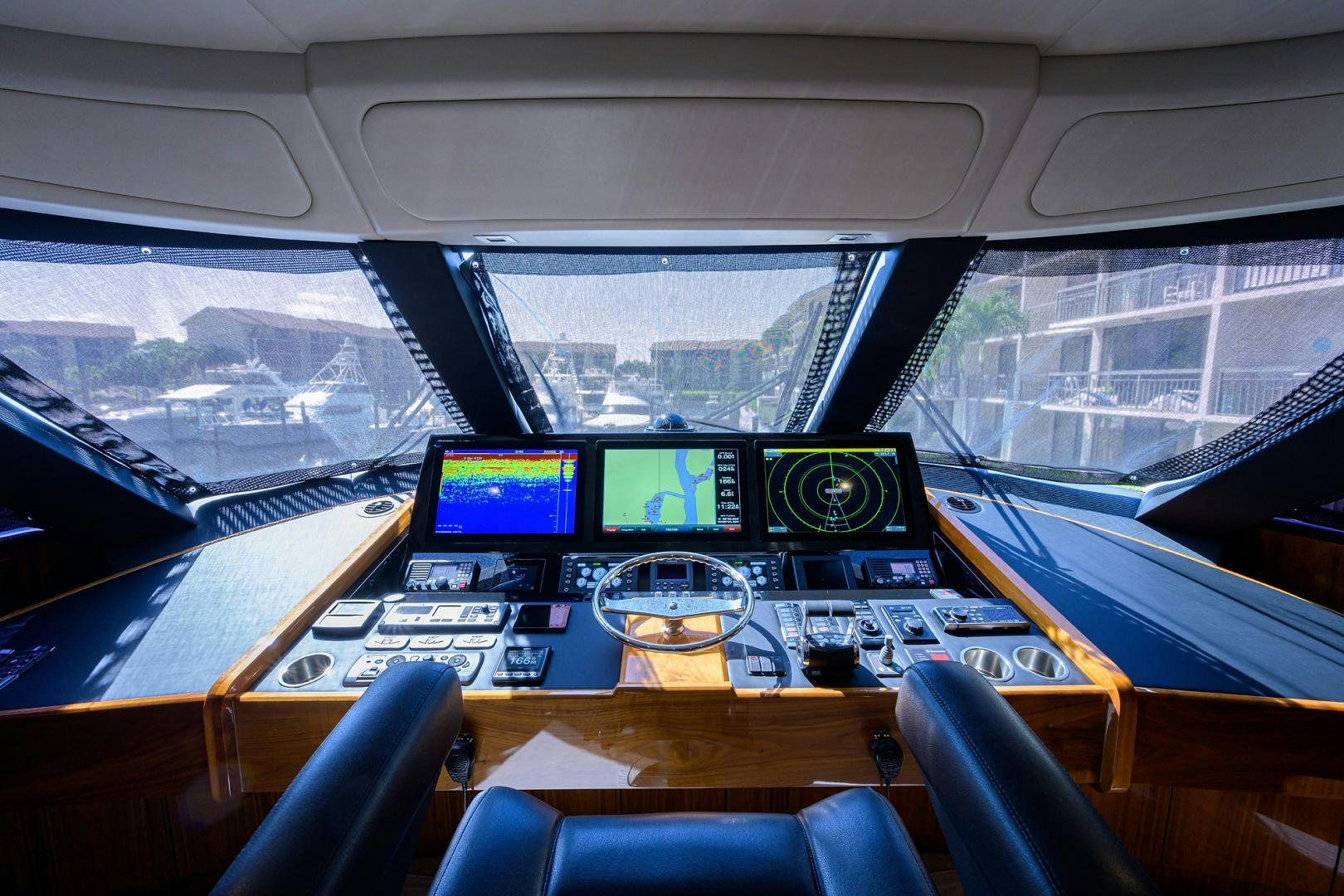 inside of a vehicle with monitors and screens aboard SET IN MY WAVES Yacht for Sale