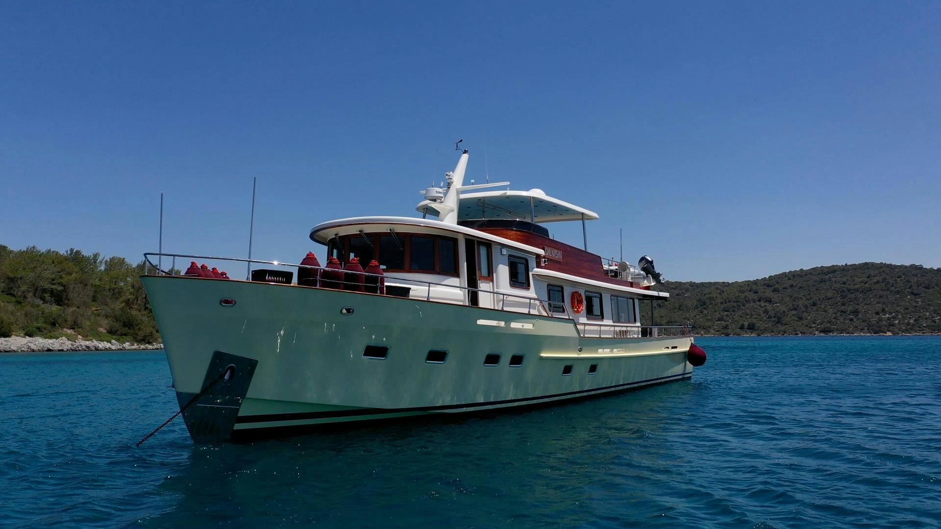 a boat on the water aboard DILNISIN Yacht for Sale