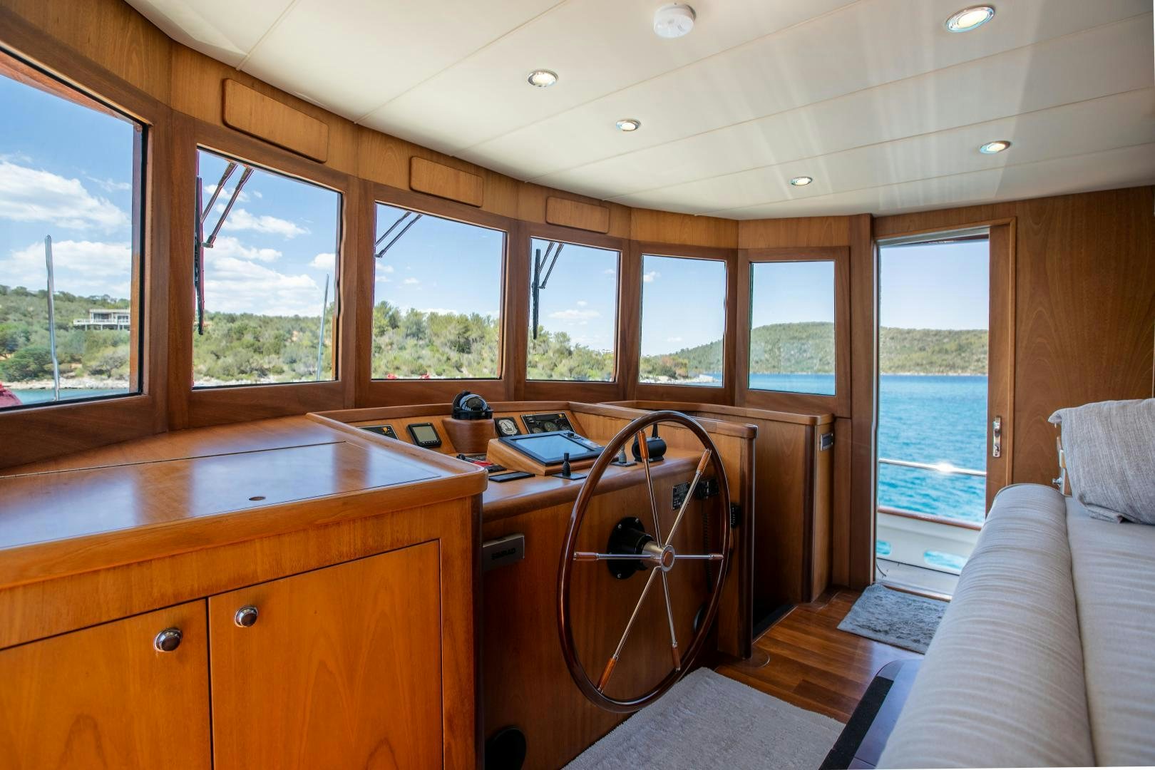 a room with a desk and a bed aboard DILNISIN Yacht for Sale