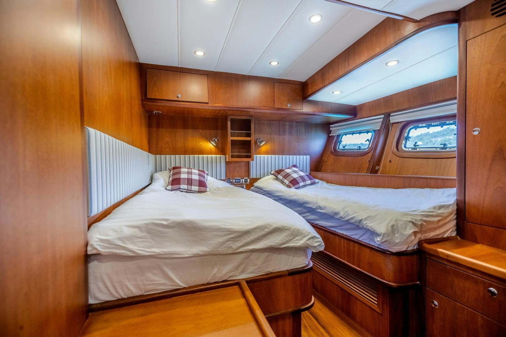 a couple of beds in a cabin aboard DILNISIN Yacht for Sale