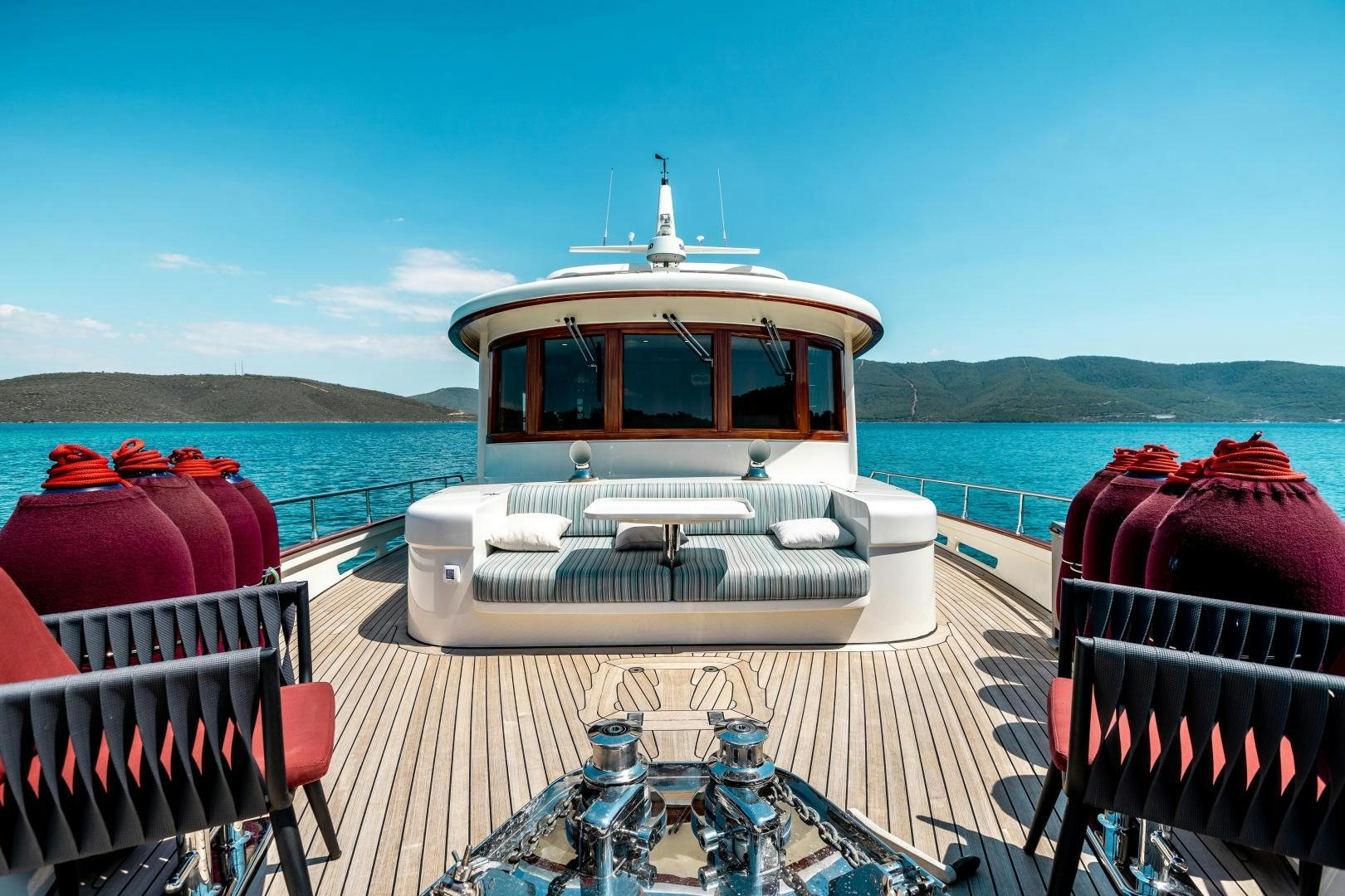 a boat on a deck aboard DILNISIN Yacht for Sale