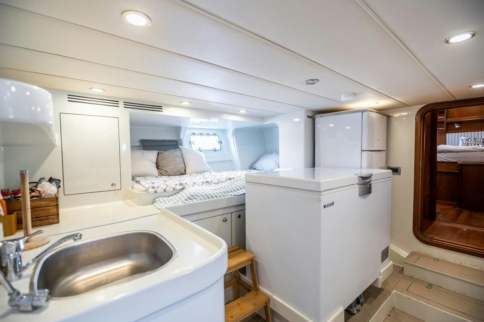 a small bathroom with a large sink aboard DILNISIN Yacht for Sale