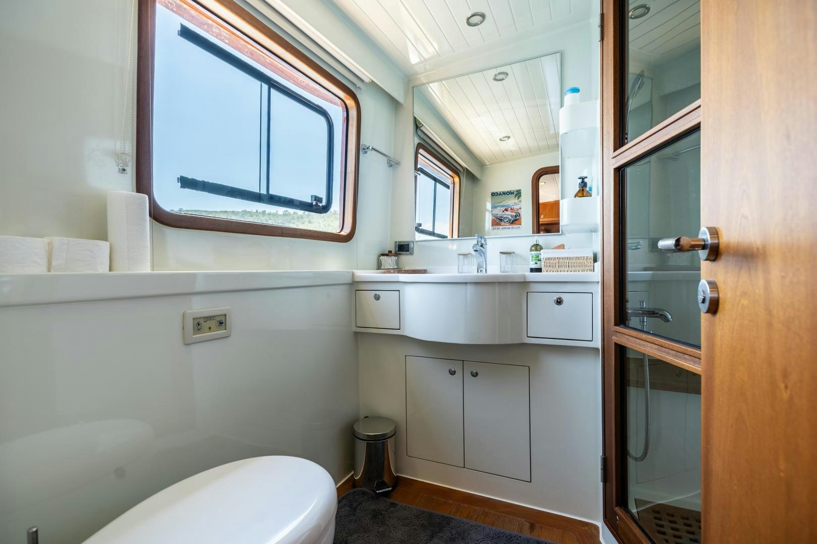 a bathroom with a toilet and a sink aboard DILNISIN Yacht for Sale