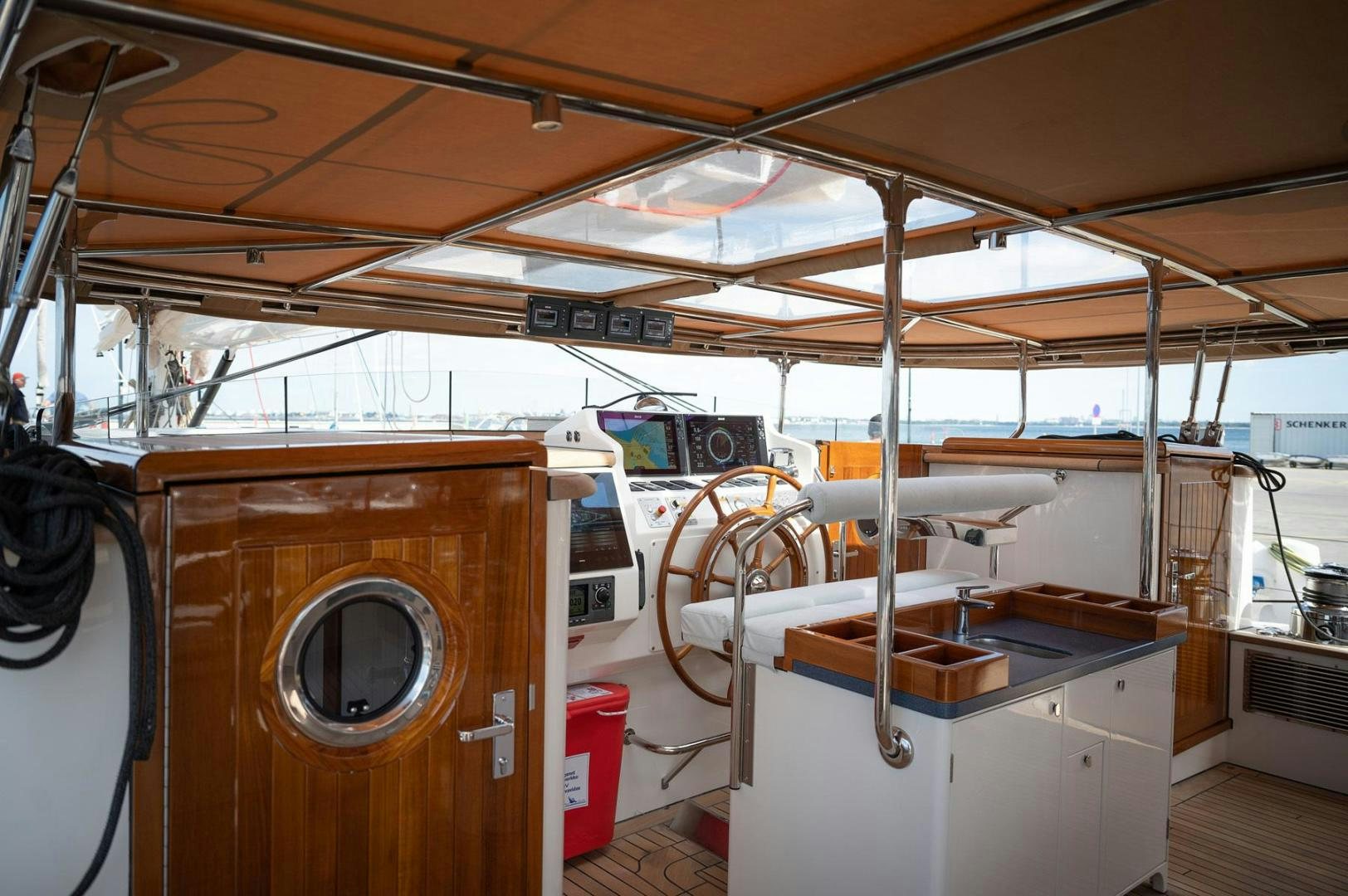 a boat with a large wooden box aboard MELODY Yacht for Sale
