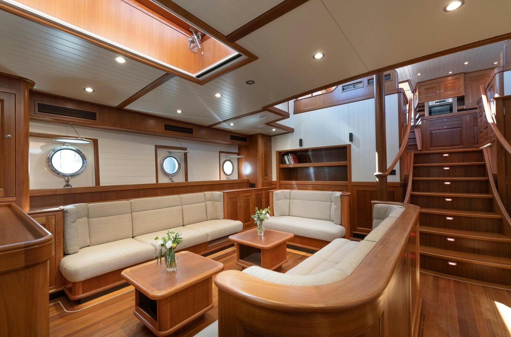 a modern looking living room aboard MELODY Yacht for Sale