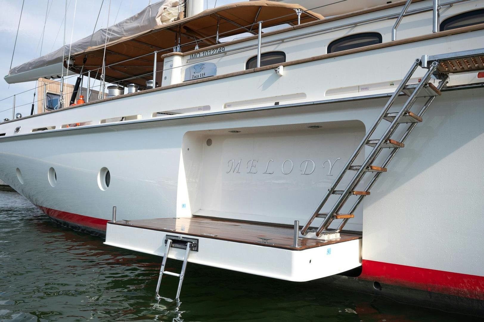 a couple of boats on the water aboard MELODY Yacht for Sale