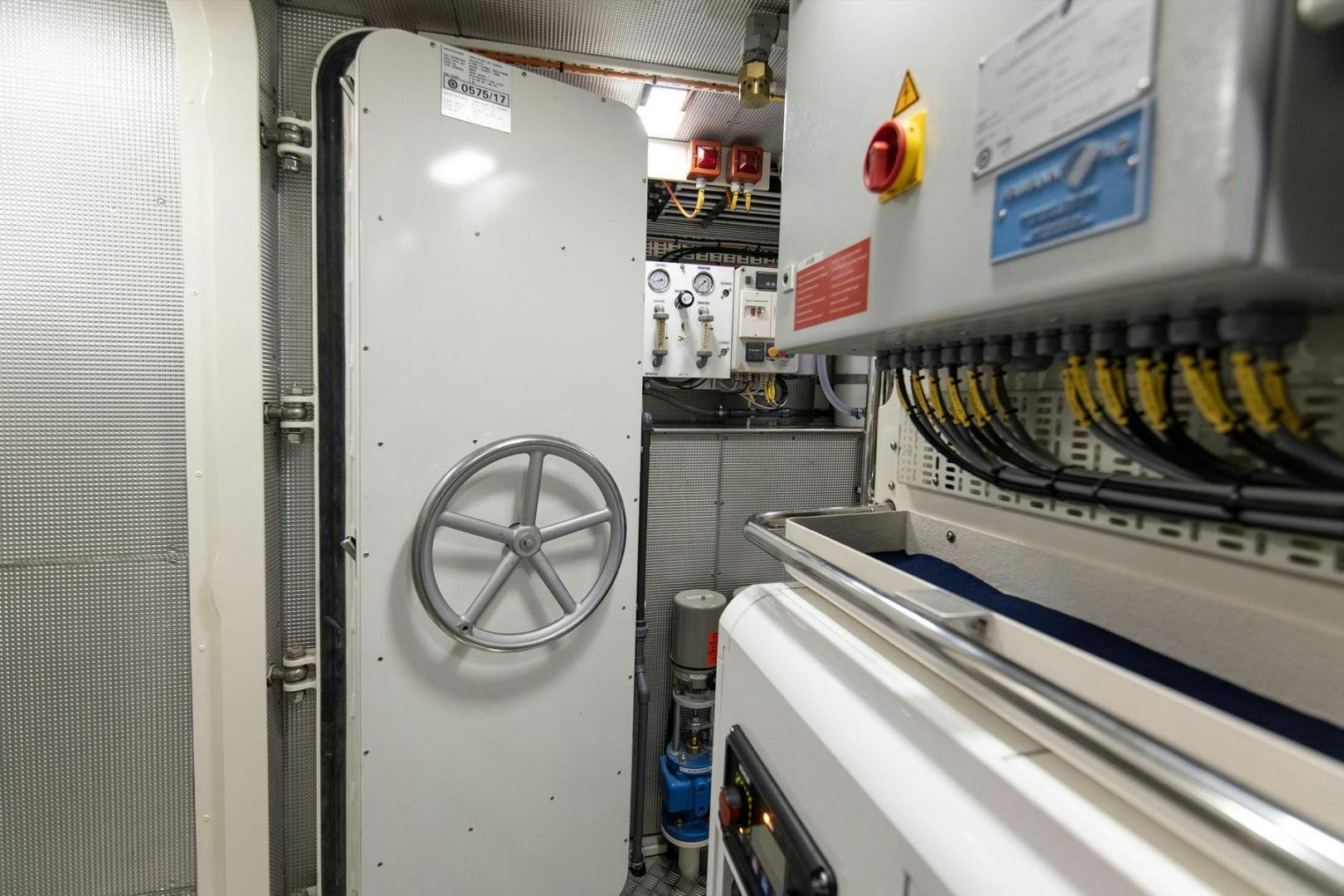 a machine in a room aboard MELODY Yacht for Sale