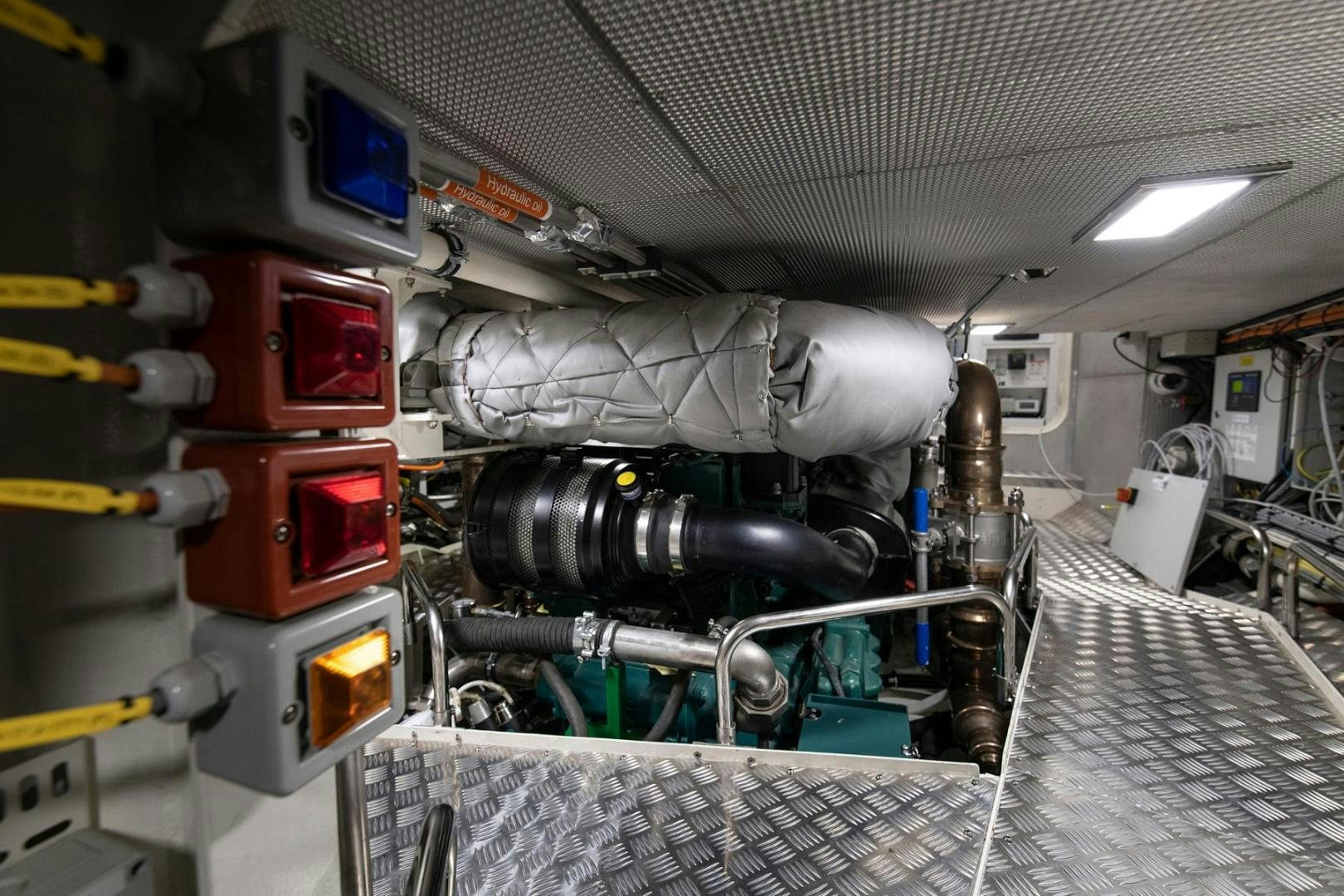 a large machine in a factory aboard MELODY Yacht for Sale