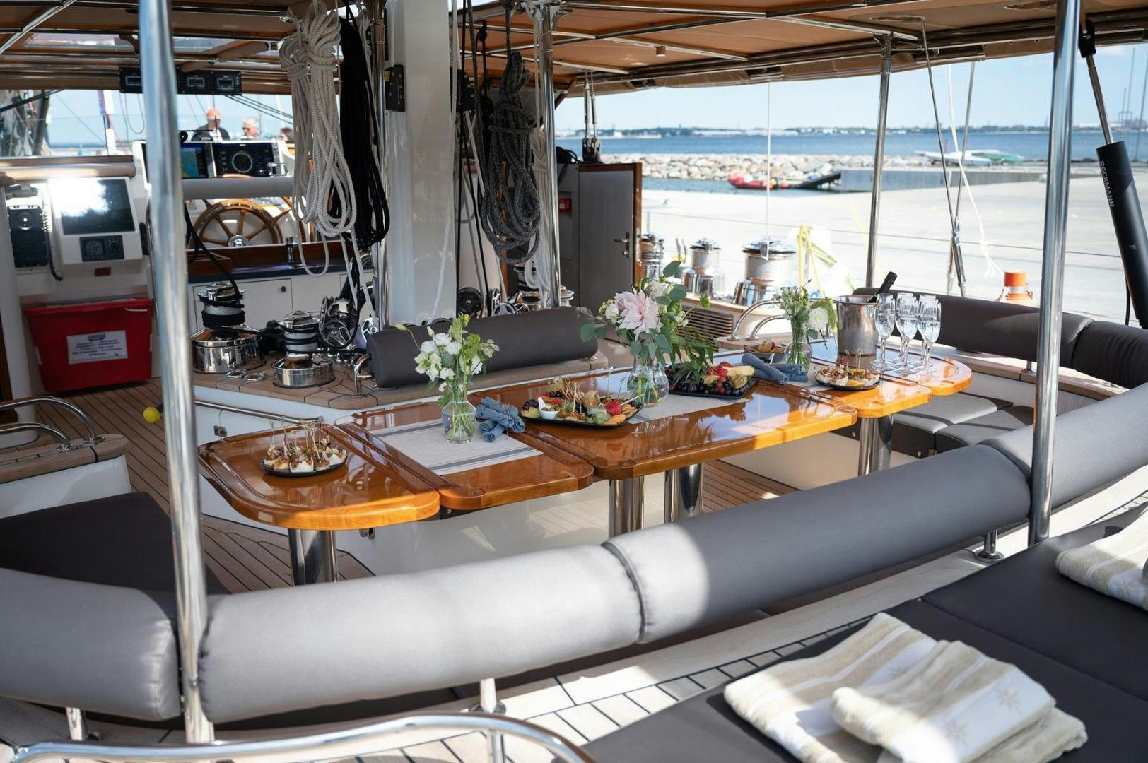 a room with a table and chairs aboard MELODY Yacht for Sale