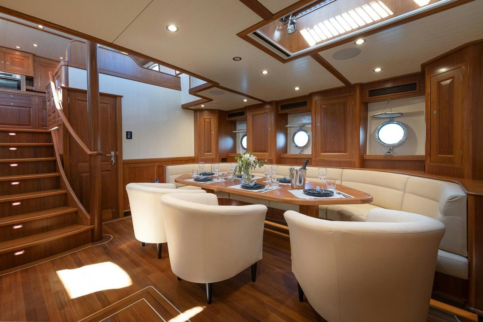 a large kitchen and dining room aboard MELODY Yacht for Sale