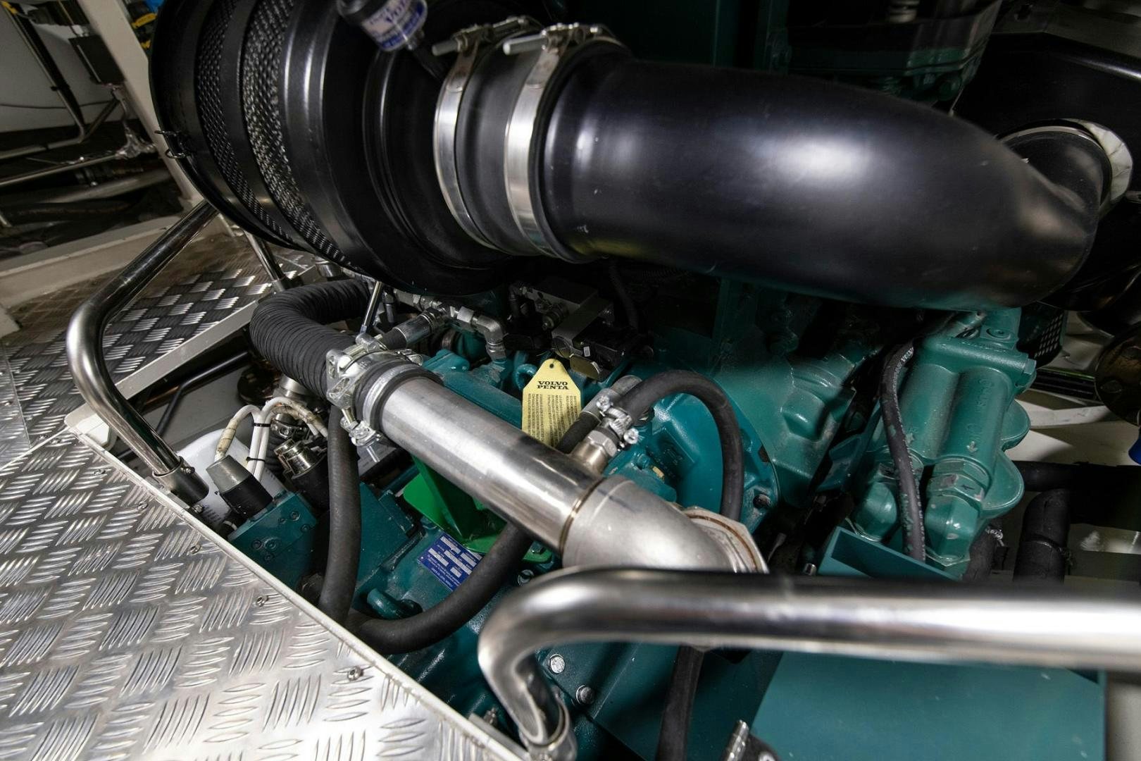 a close-up of a car engine aboard MELODY Yacht for Sale