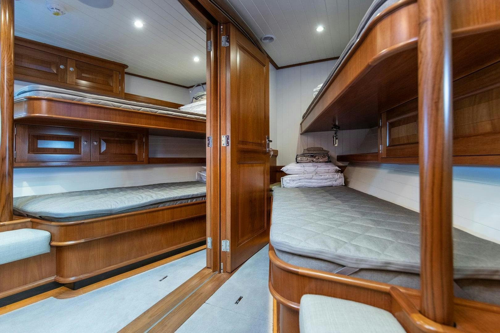 a room with bunk beds aboard MELODY Yacht for Sale