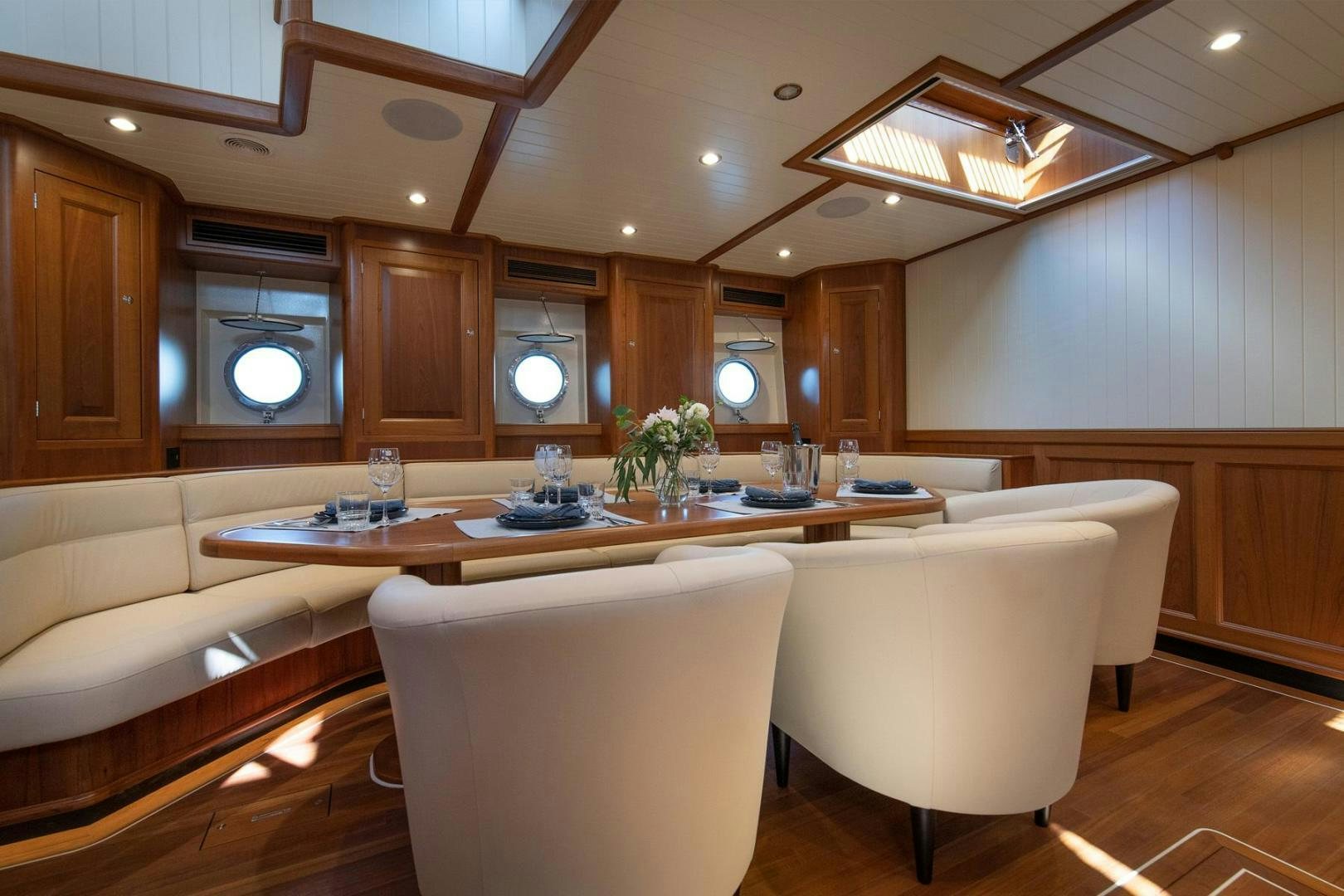 a large kitchen with a large island aboard MELODY Yacht for Sale