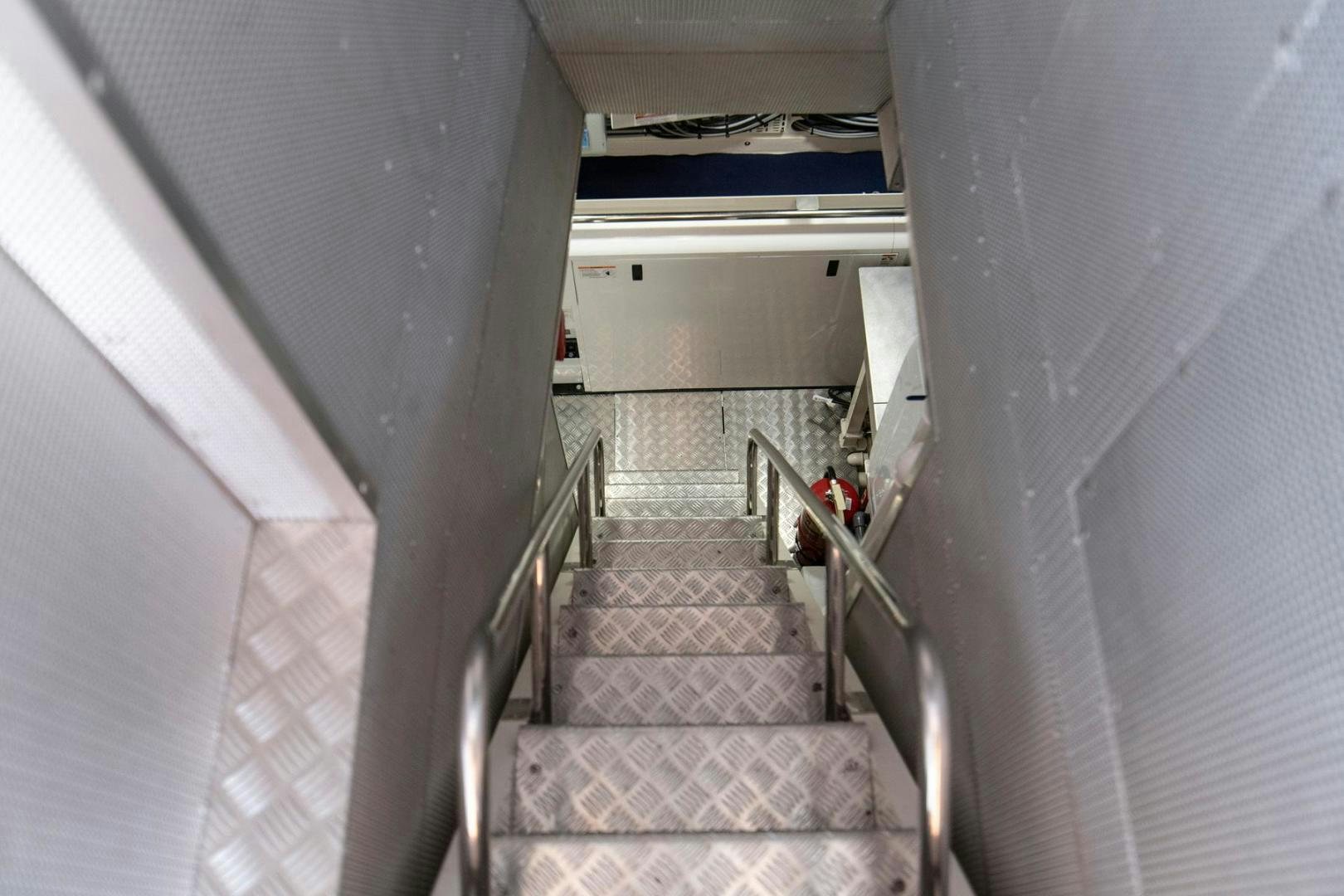 a staircase in a building aboard MELODY Yacht for Sale