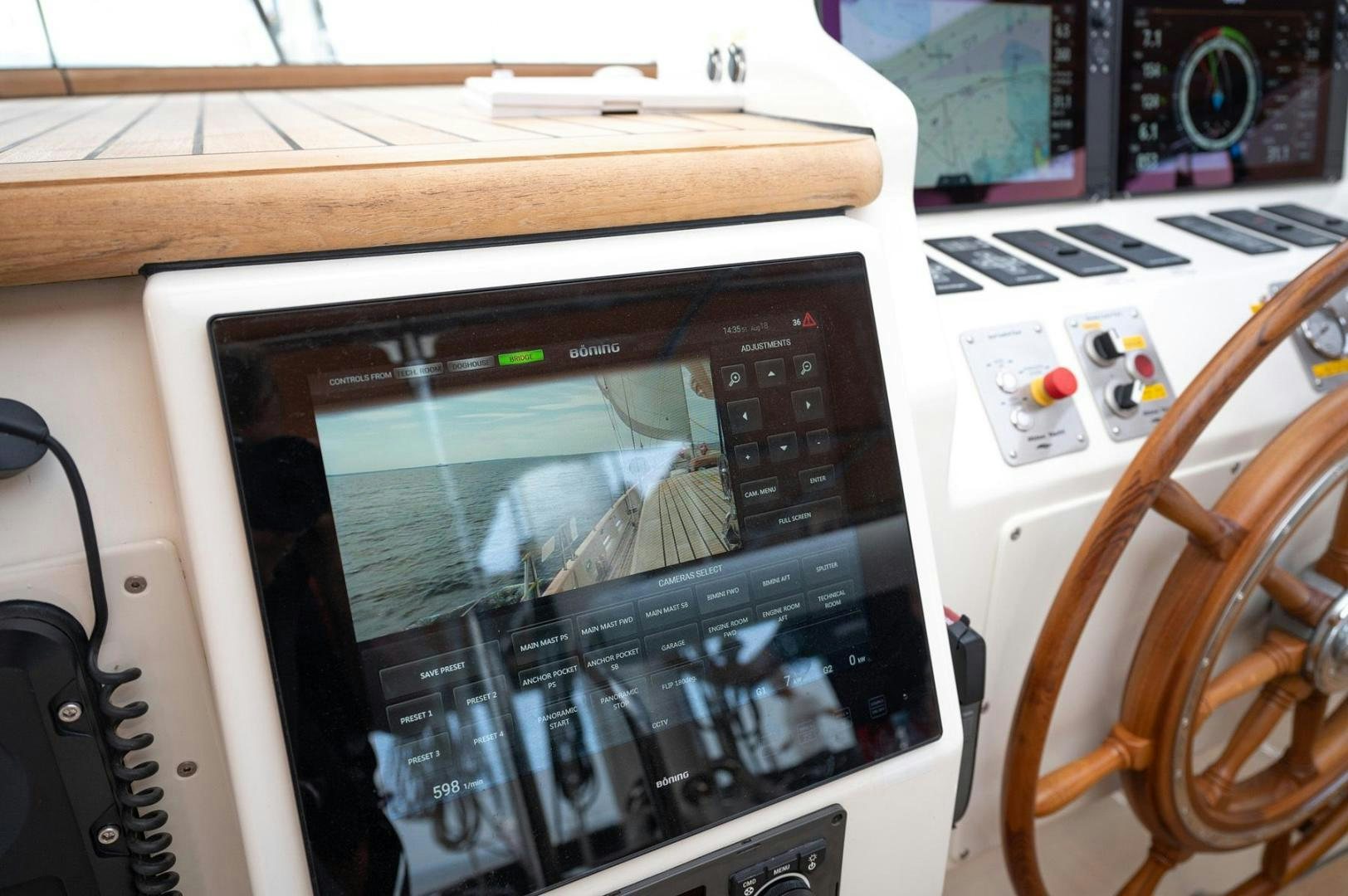 a tablet on a table aboard MELODY Yacht for Sale