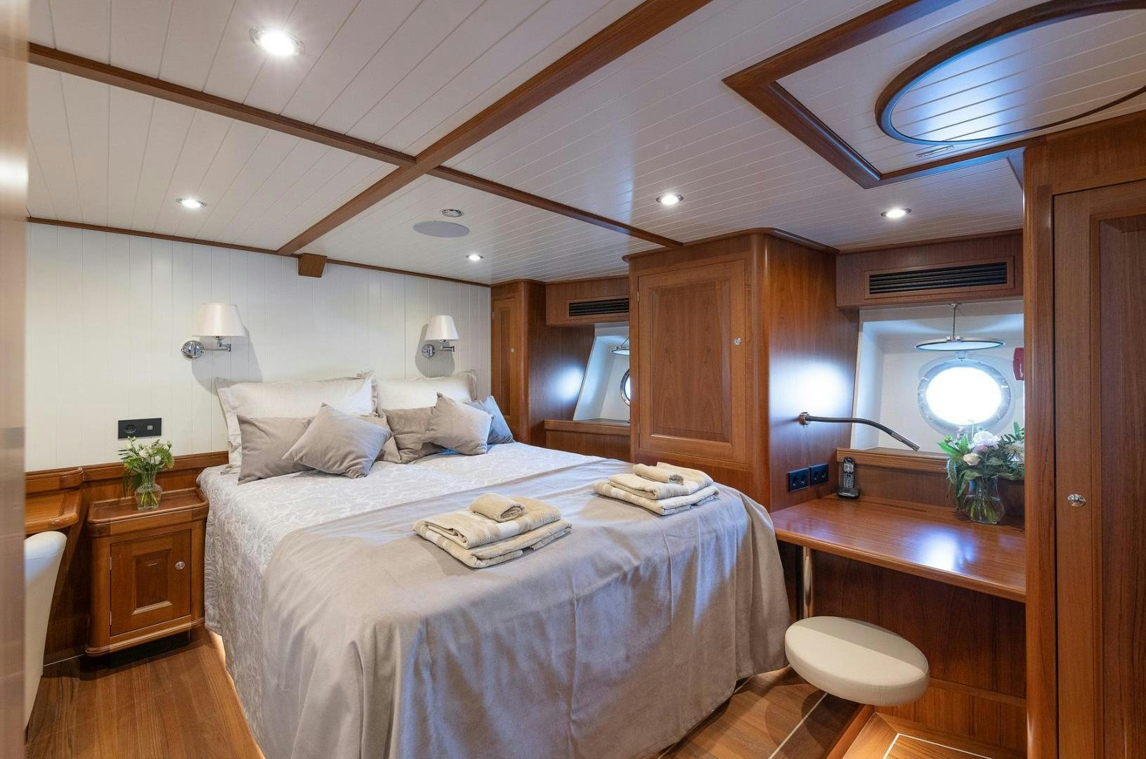 a bed in a room aboard MELODY Yacht for Sale