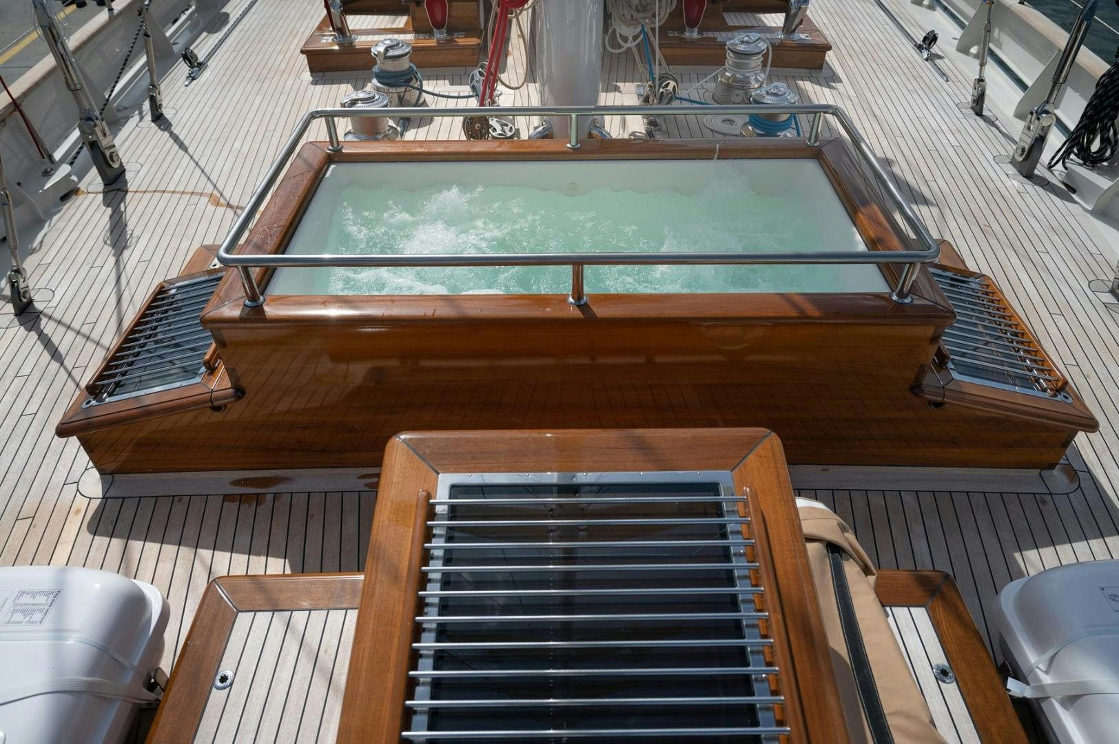 a large staircase with a glass roof aboard MELODY Yacht for Sale