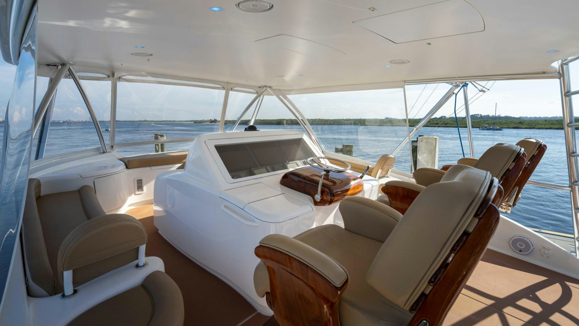 a boat with seats and a table aboard HOW SWEET IT IS Yacht for Sale