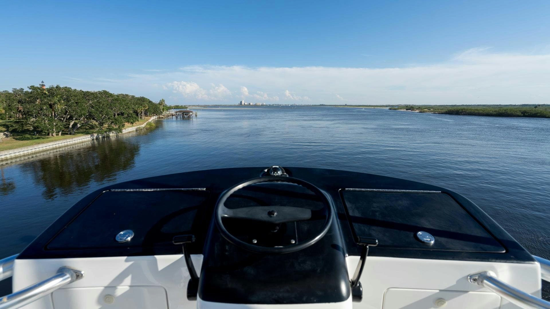 a car driving on a river aboard HOW SWEET IT IS Yacht for Sale