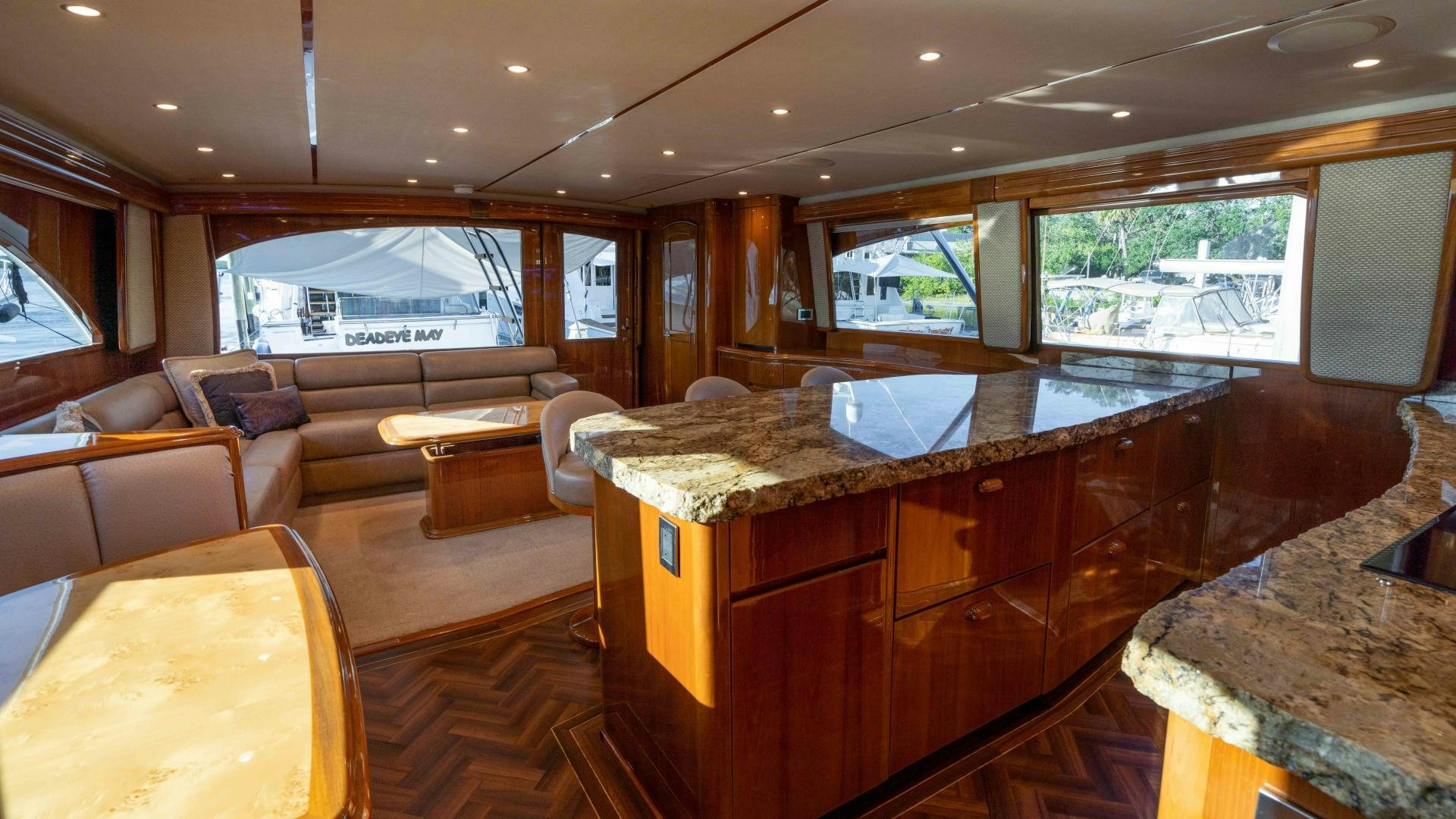 a large kitchen and living room aboard HOW SWEET IT IS Yacht for Sale