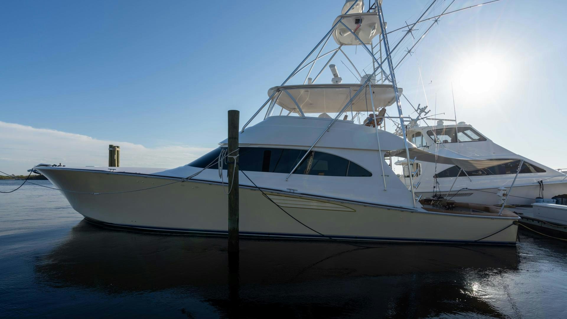 a couple of boats in a harbor aboard HOW SWEET IT IS Yacht for Sale