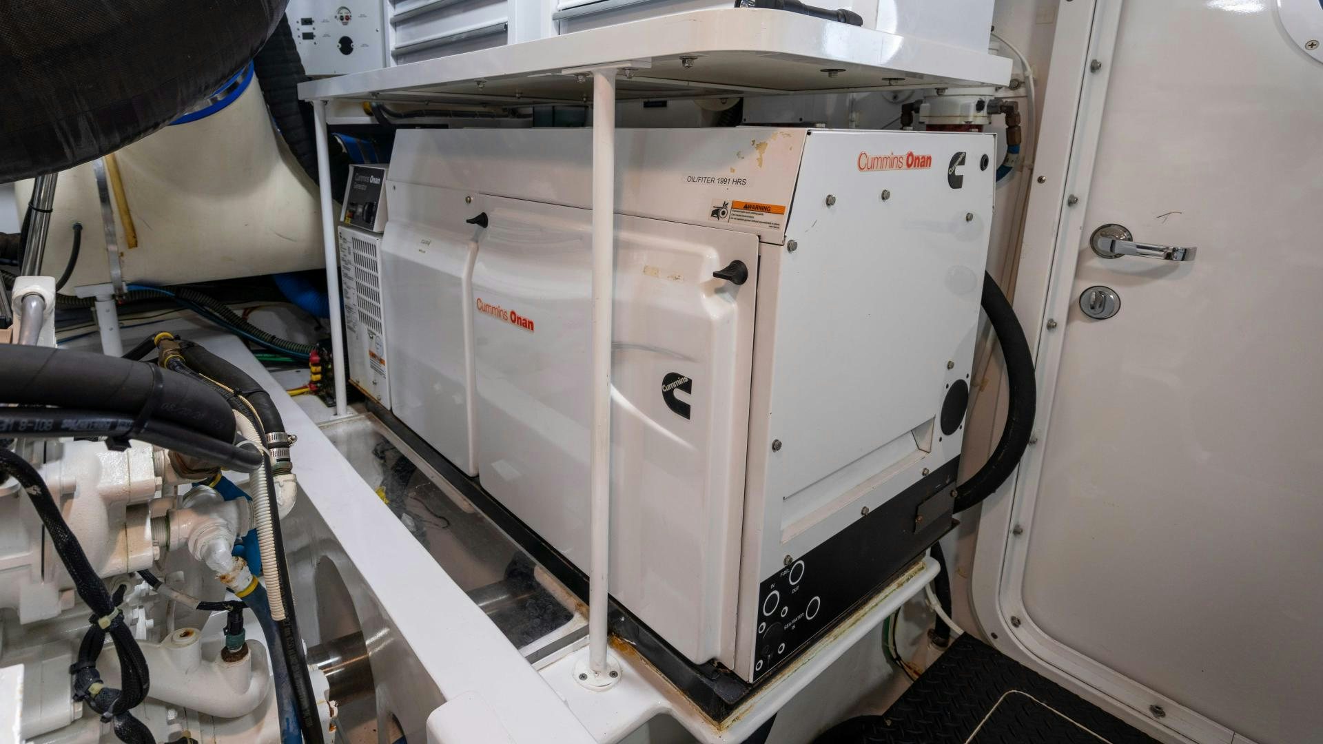 a machine with a large white object on the back aboard HOW SWEET IT IS Yacht for Sale