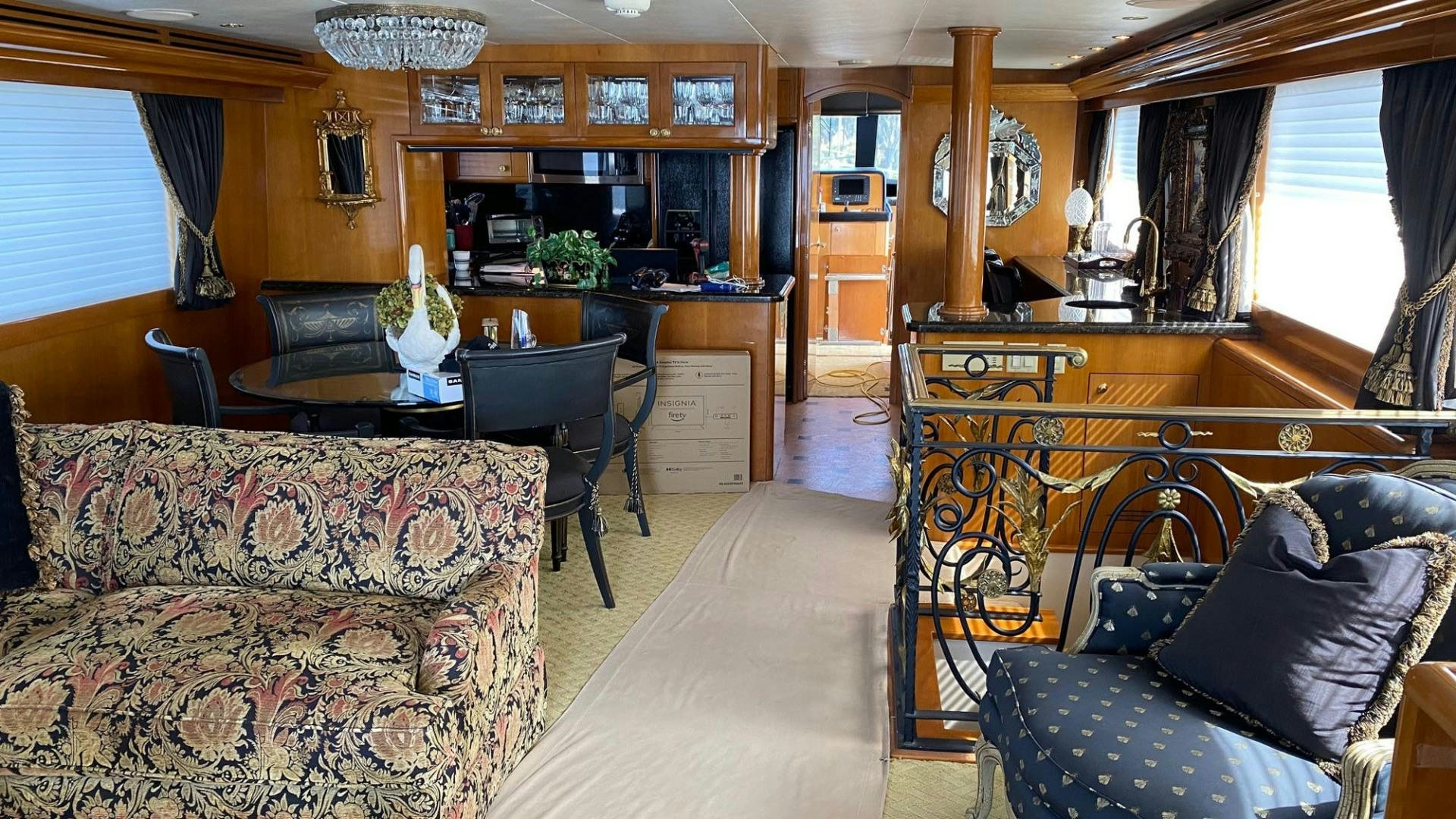 a living room with a couch and a piano aboard SOCIAL DIRECTOR Yacht for Sale