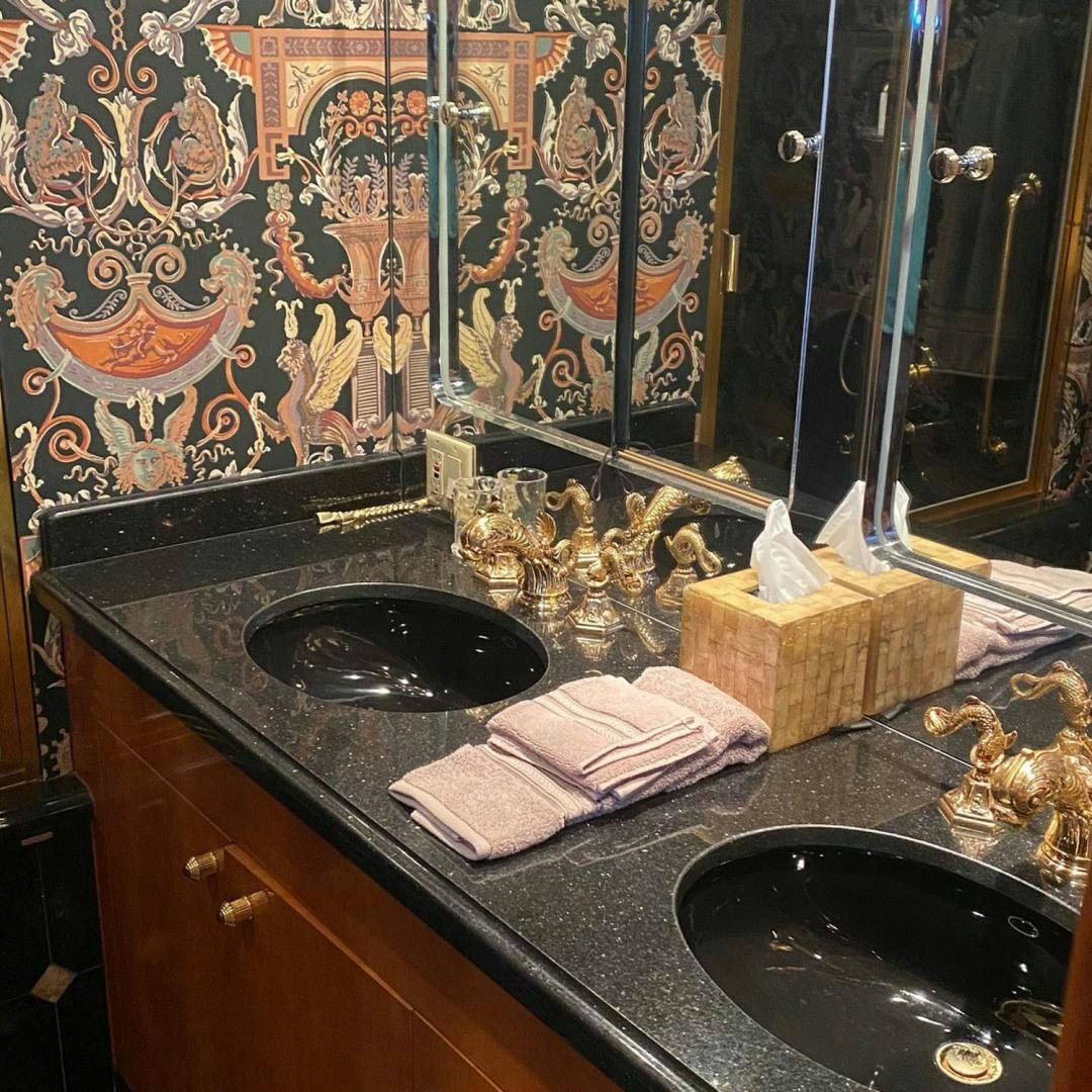 a bathroom with a sink and a mirror aboard SOCIAL DIRECTOR Yacht for Sale