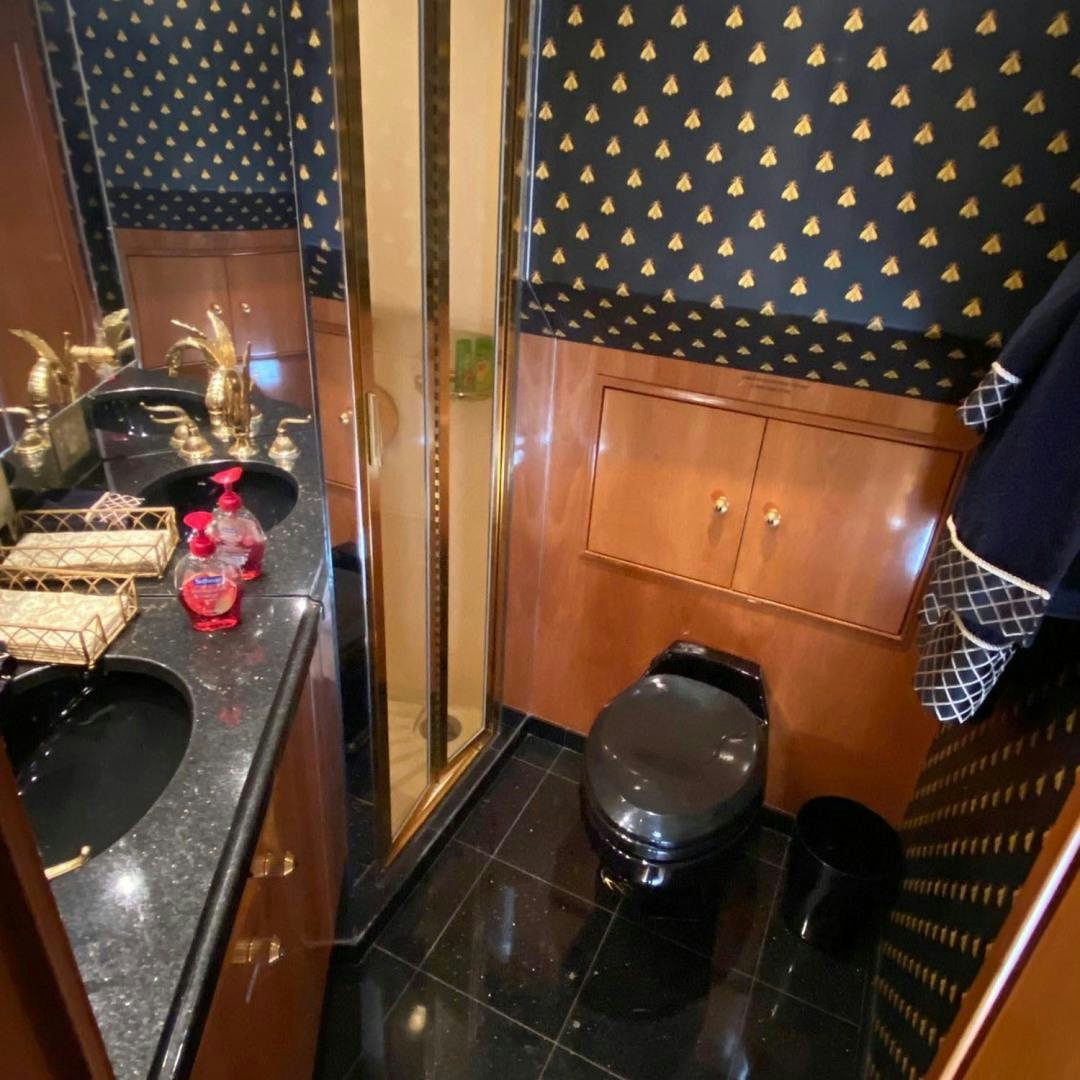 a kitchen with a sink and a counter aboard SOCIAL DIRECTOR Yacht for Sale