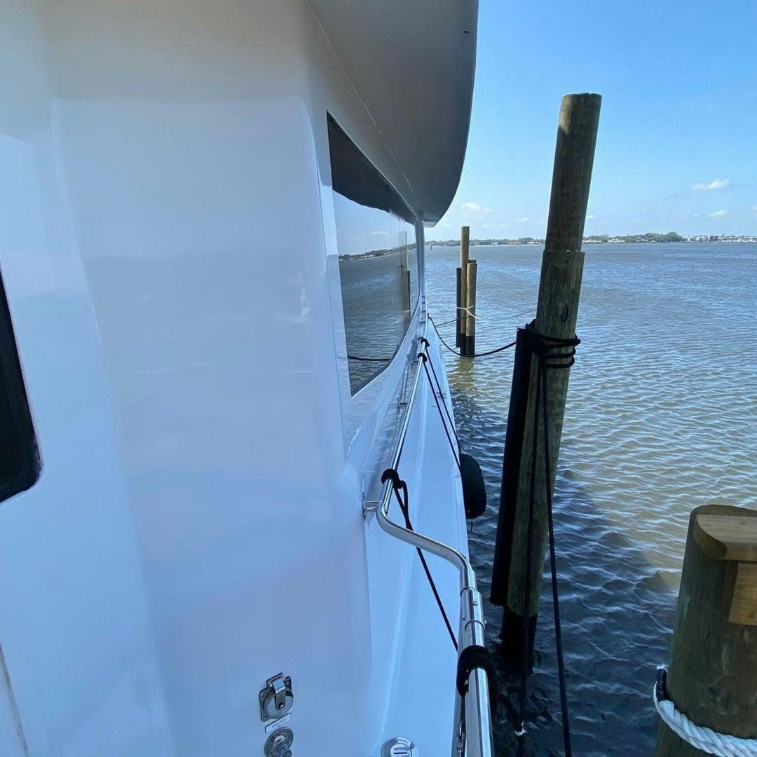 a boat on the water aboard SOCIAL DIRECTOR Yacht for Sale