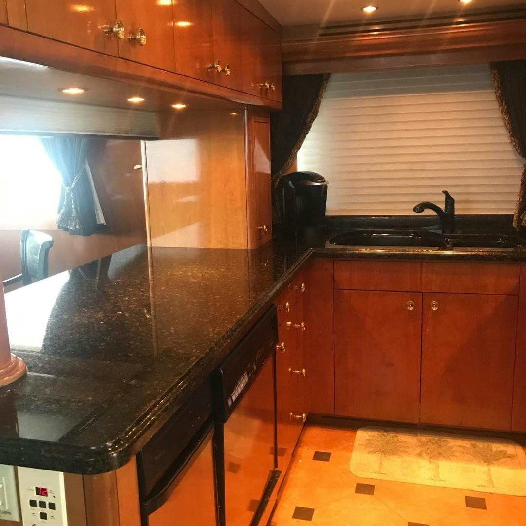 a kitchen with a large counter aboard SOCIAL DIRECTOR Yacht for Sale