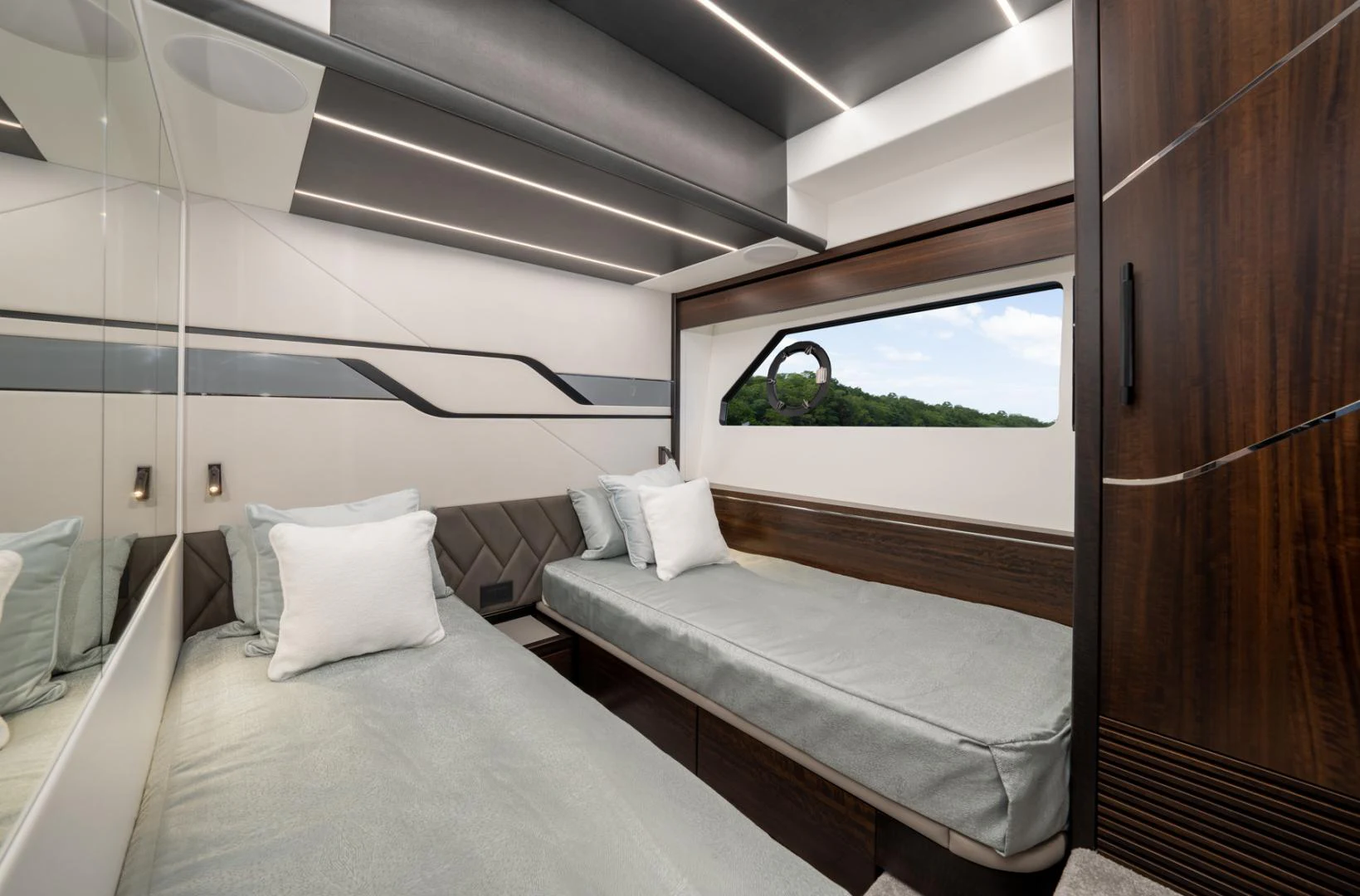a room with two beds aboard DEALER DEMO Yacht for Sale
