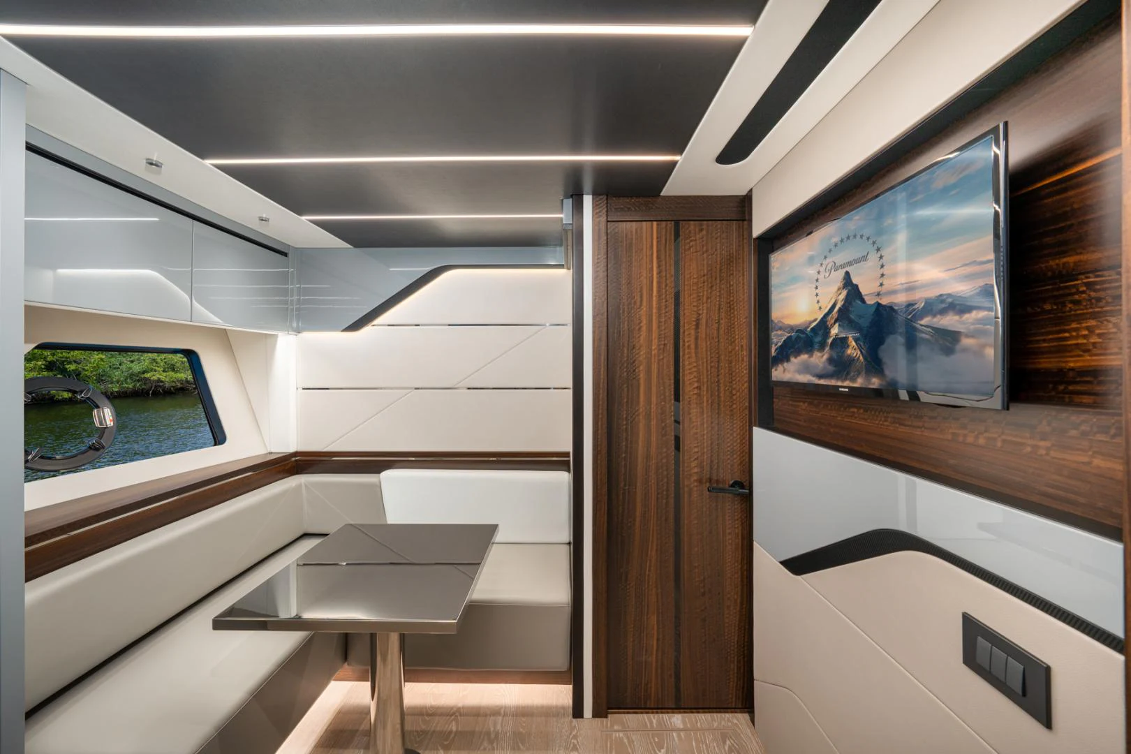 a room with a wood cabinet and a painting on the wall aboard DEALER DEMO Yacht for Sale