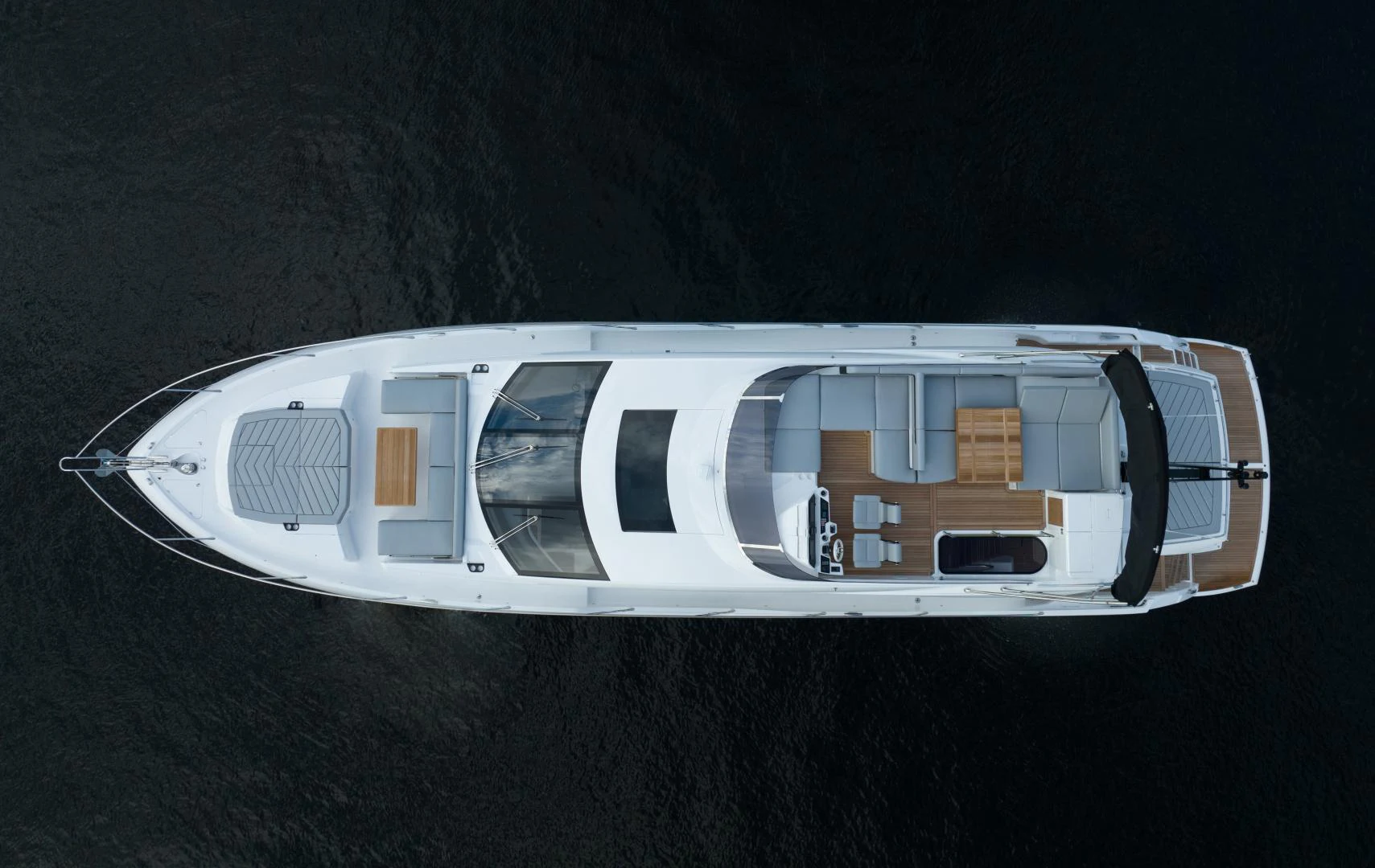 a white house with a black roof aboard DEALER DEMO Yacht for Sale