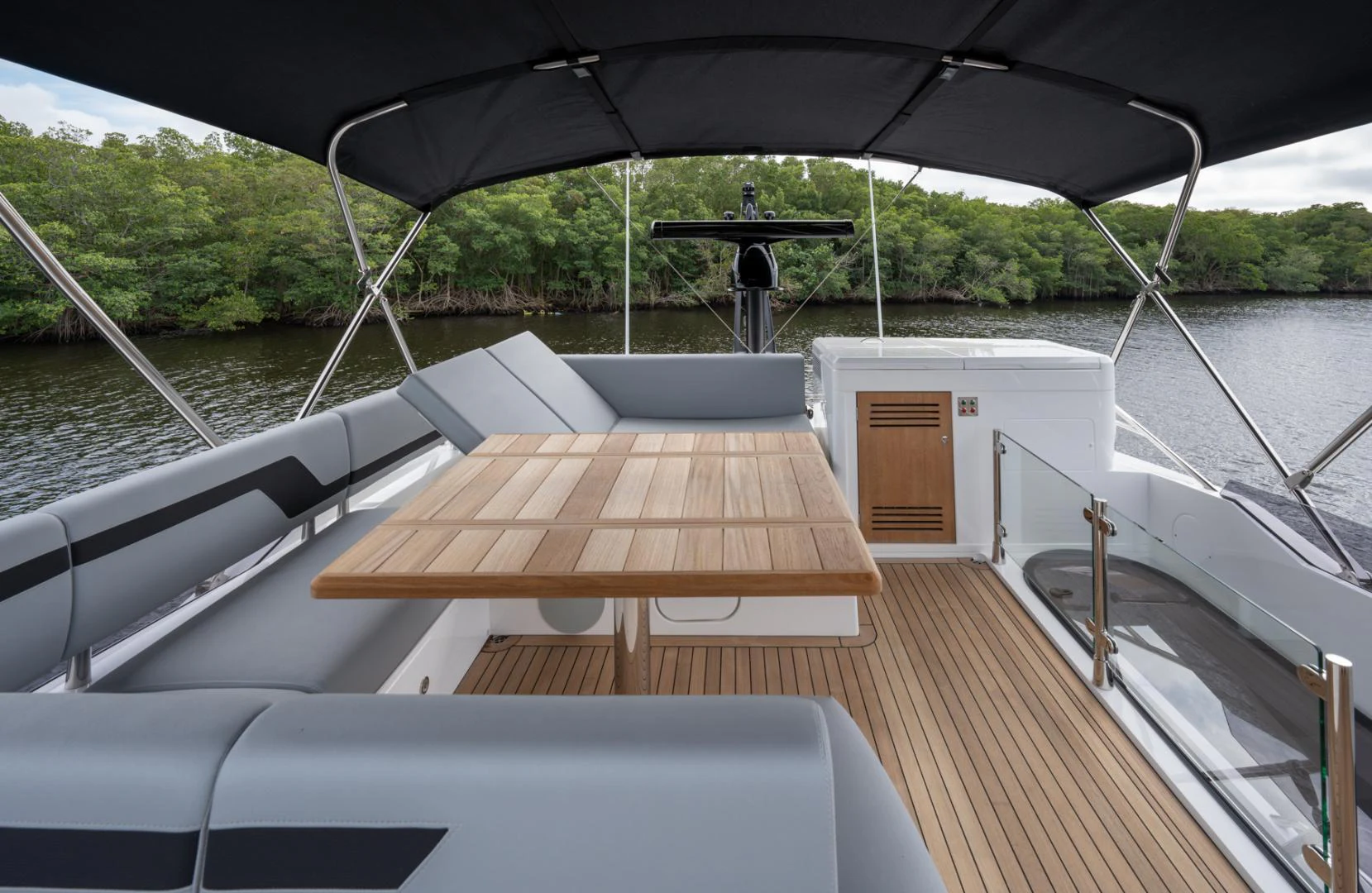a boat on a water body aboard DEALER DEMO Yacht for Sale