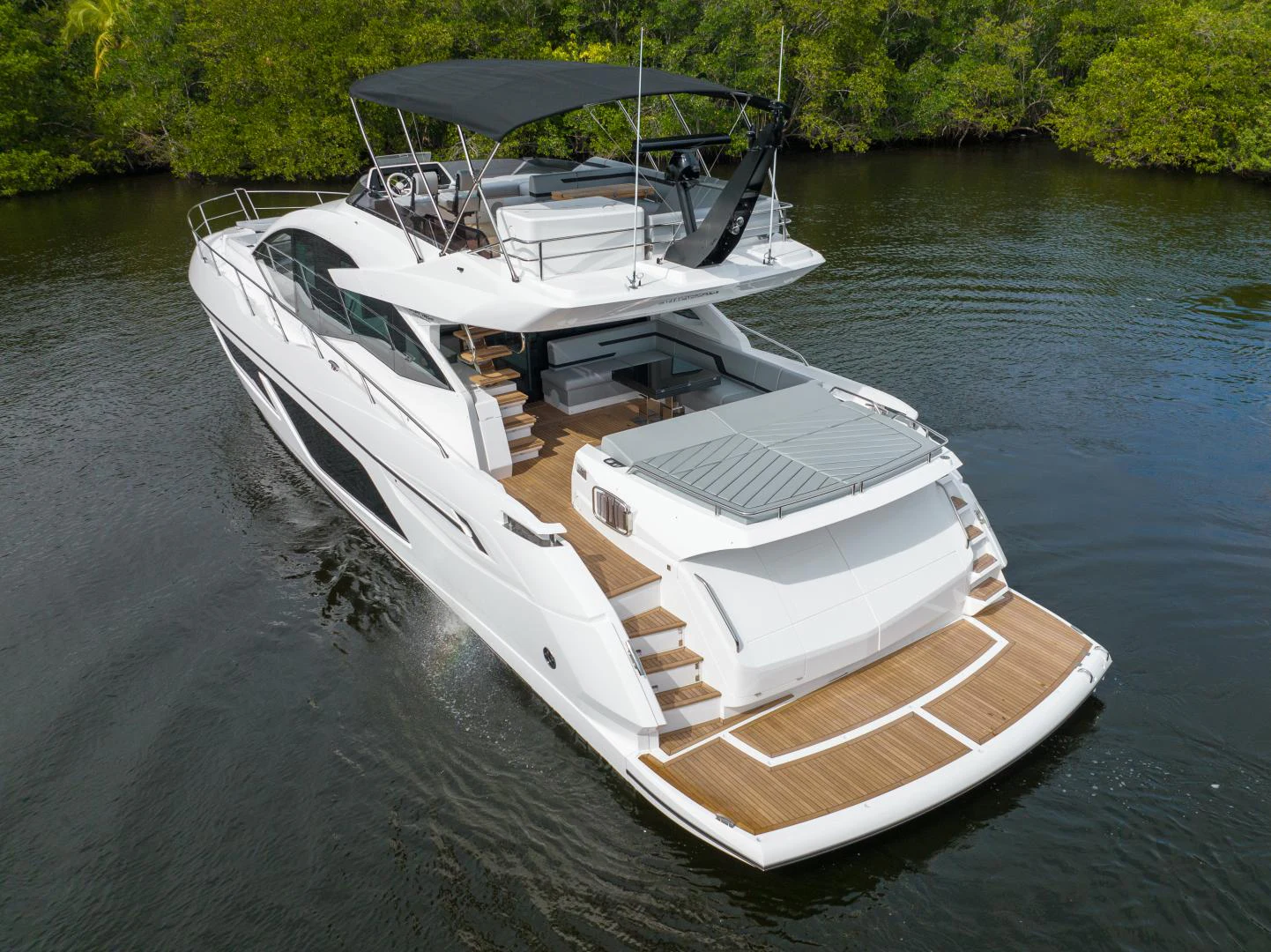 a boat on the water aboard DEALER DEMO Yacht for Sale