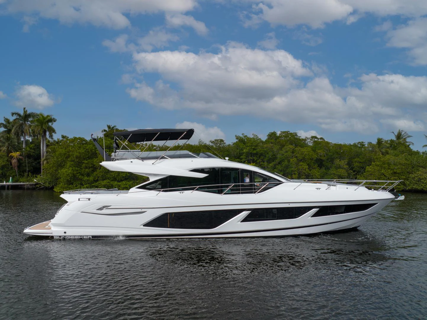 a boat on the water aboard DEALER DEMO Yacht for Sale
