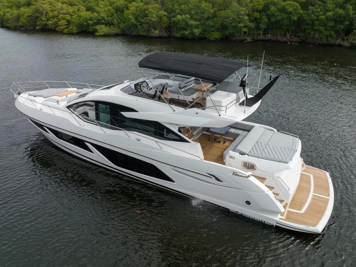 a boat on the water aboard DEALER DEMO Yacht for Sale