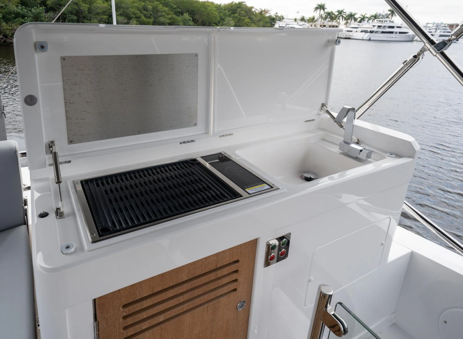 a white bathtub with a sink and a faucet aboard DEALER DEMO Yacht for Sale