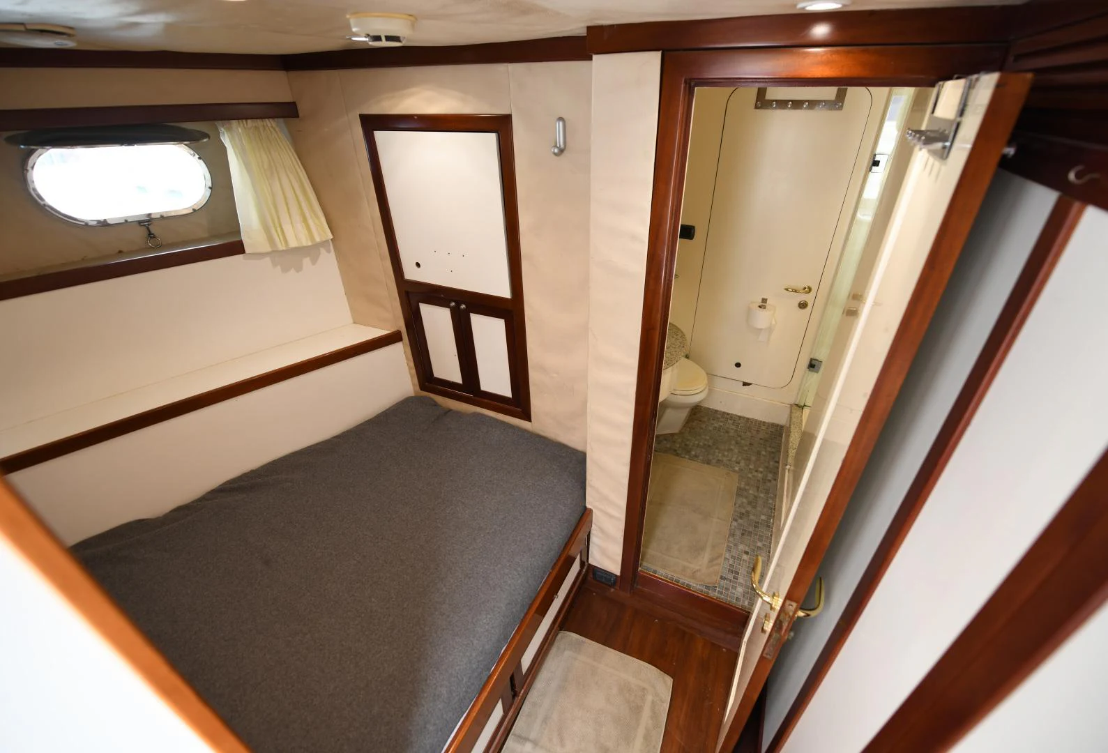a bathroom with a tub and a sink aboard AMARELLA F Yacht for Sale