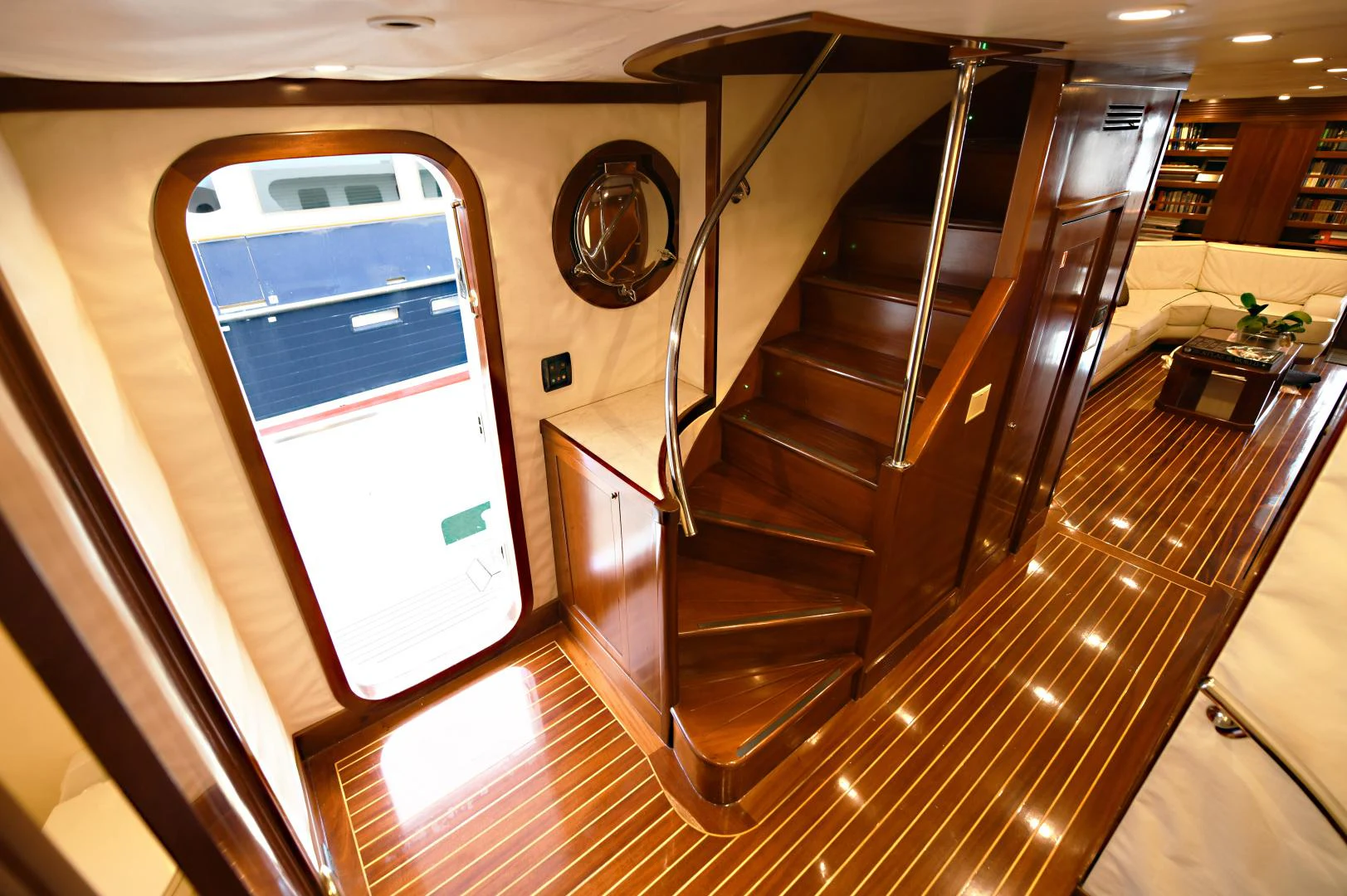 a room with a door and a staircase aboard AMARELLA F Yacht for Sale