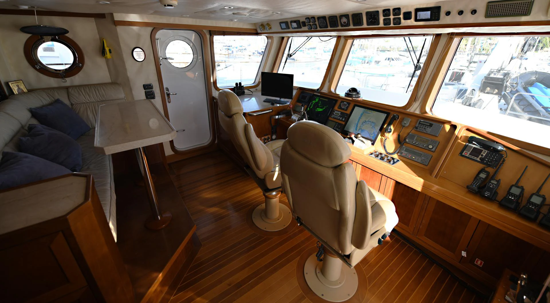 a room with a desk and a bed aboard AMARELLA F Yacht for Sale