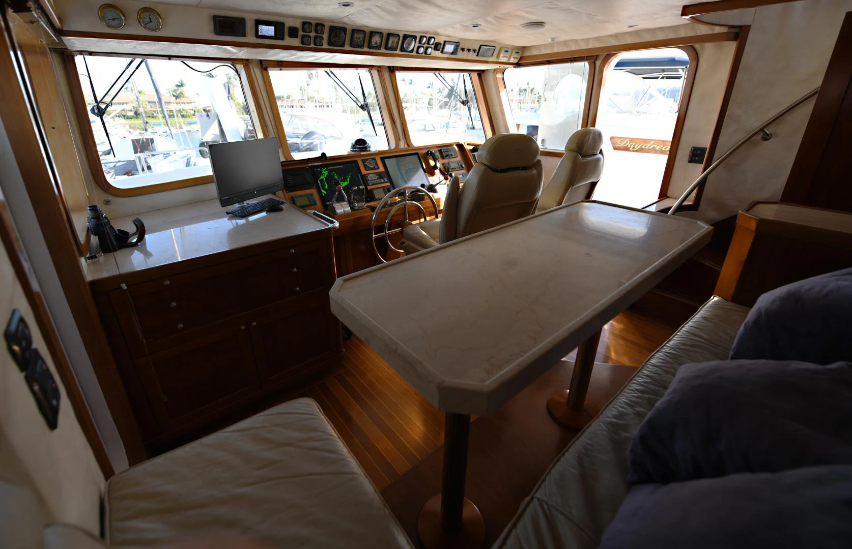 a small table in a bus aboard AMARELLA F Yacht for Sale
