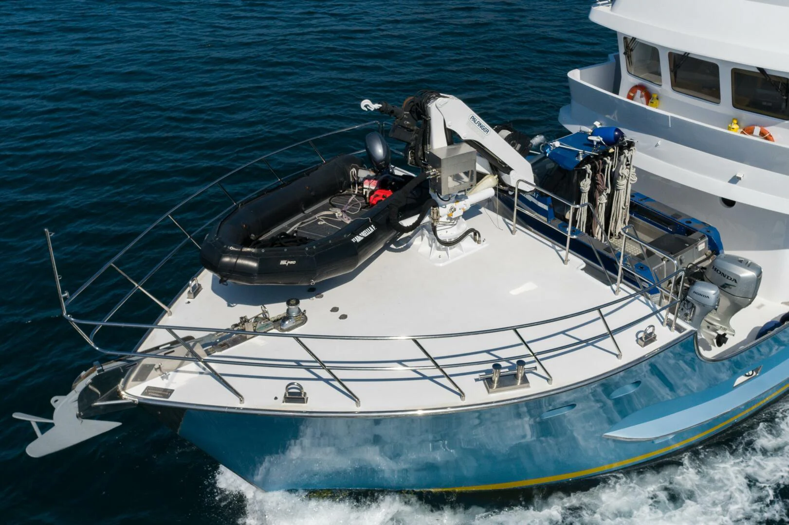 a boat with a helicopter on it aboard AMARELLA F Yacht for Sale