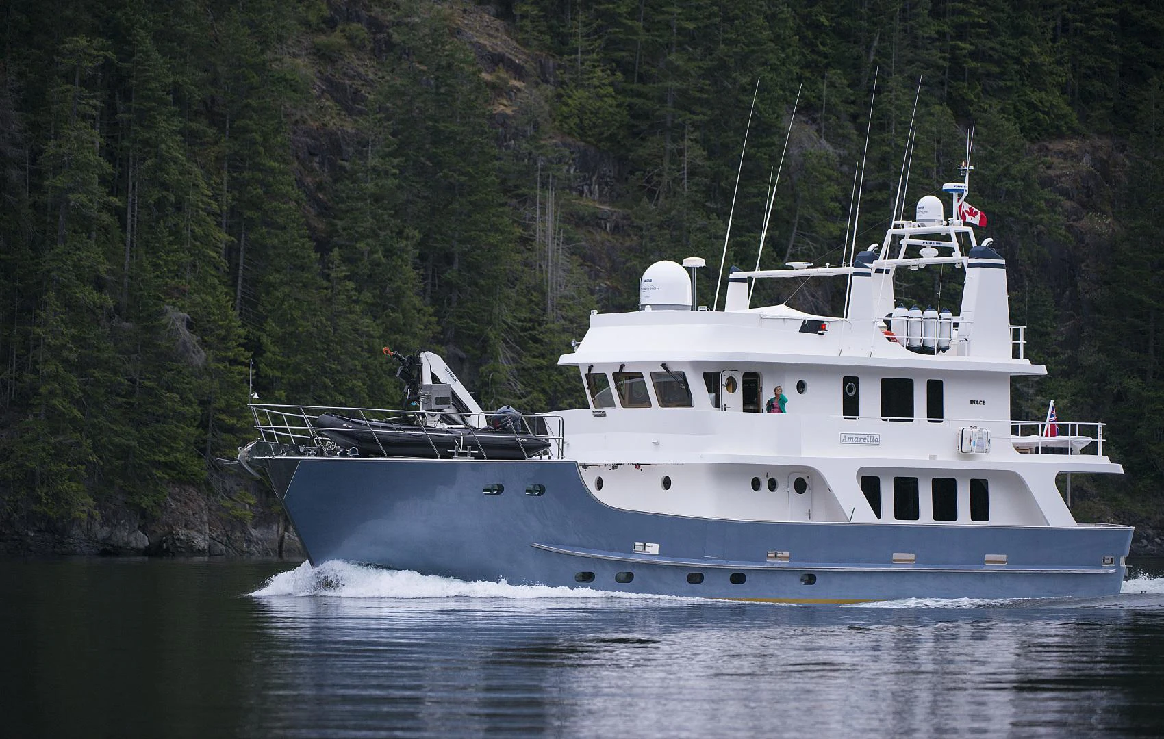 a large white boat on the water aboard AMARELLA F Yacht for Sale