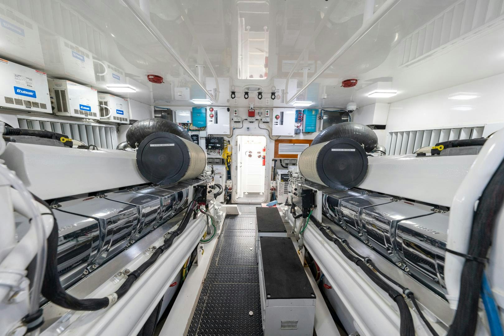 a room with machines and pipes aboard MM CRICKET Yacht for Sale