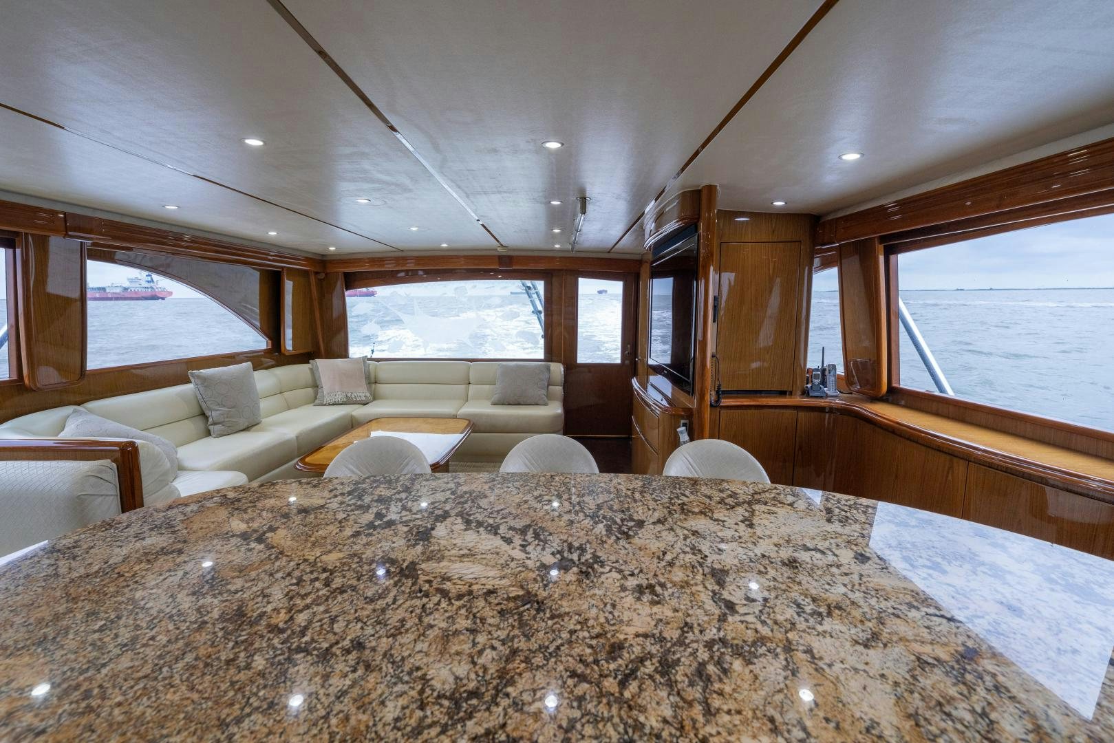 a large bed in a room aboard MM CRICKET Yacht for Sale