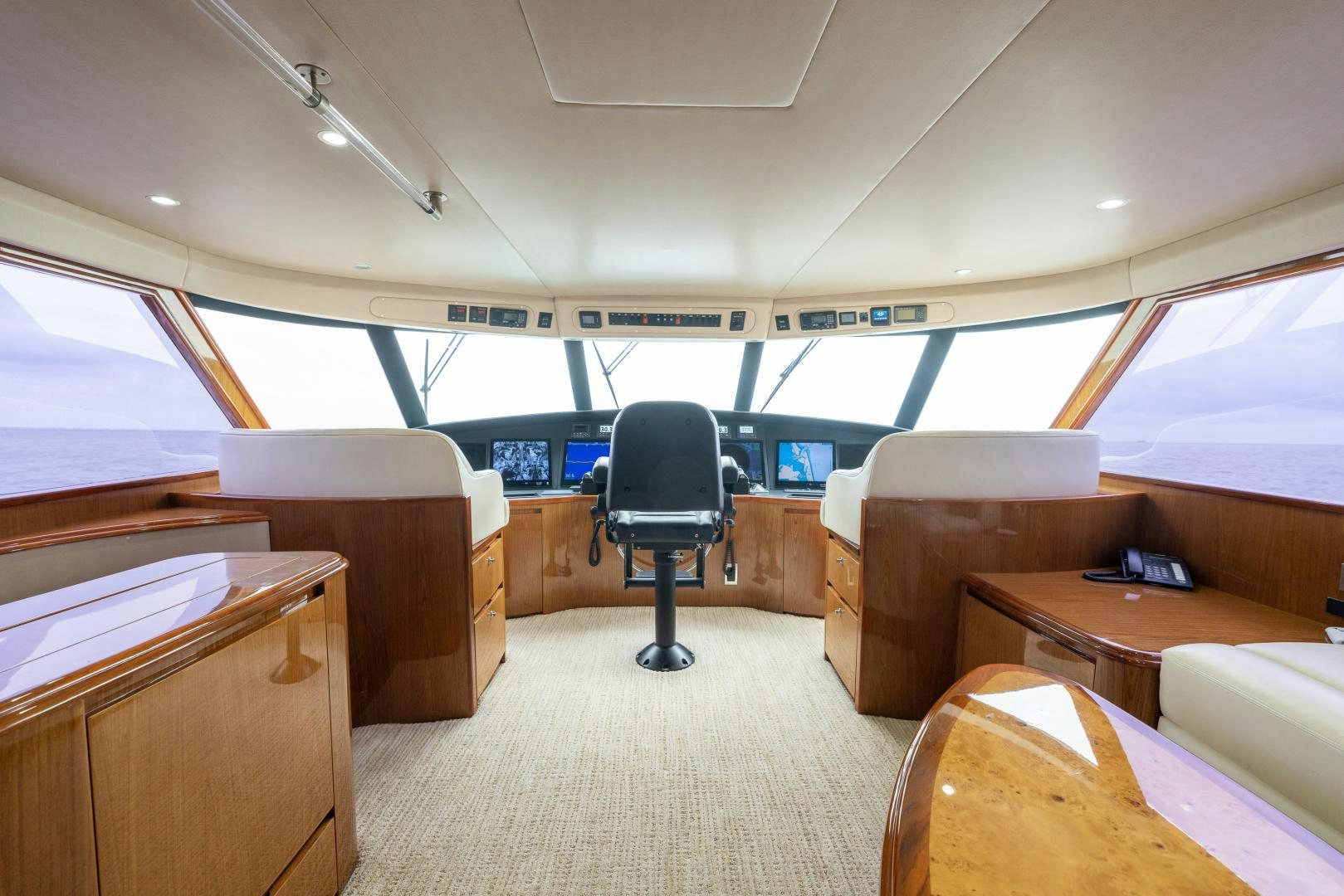 inside of a vehicle with a chair and a desk aboard MM CRICKET Yacht for Sale
