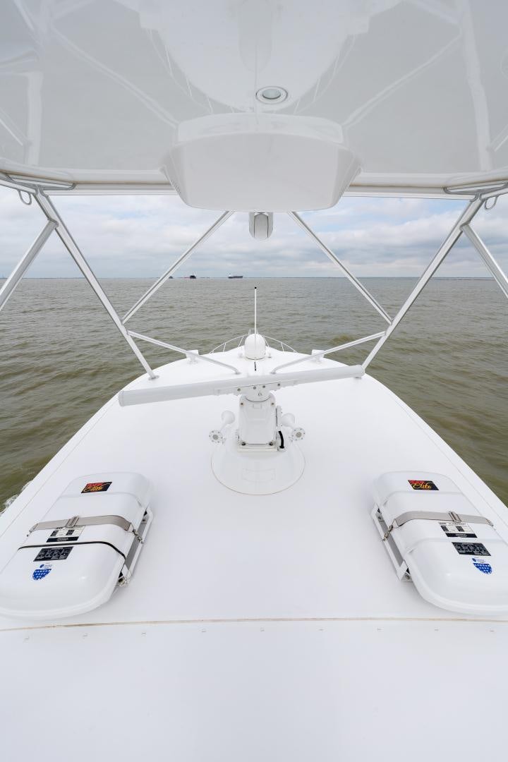 a white boat with a white propeller aboard MM CRICKET Yacht for Sale